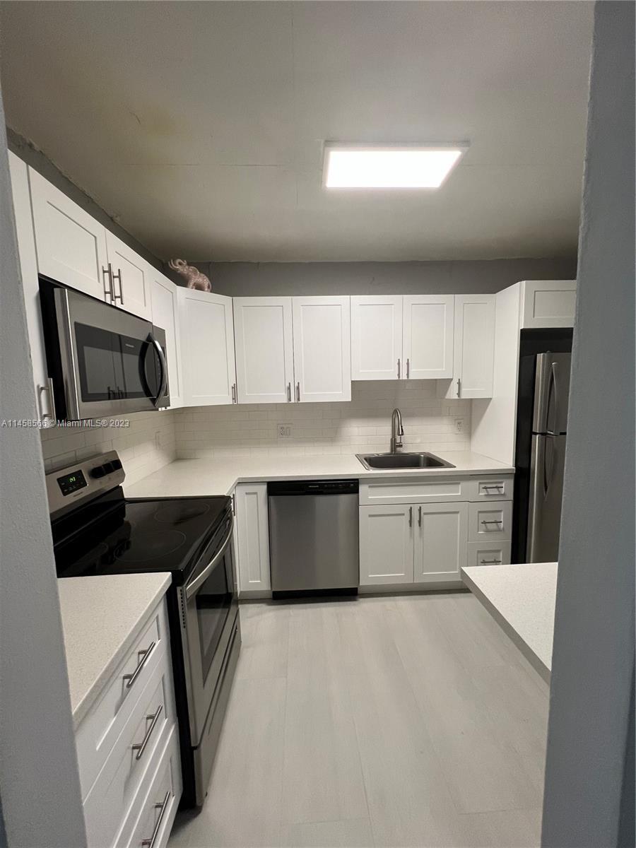 Photo of 1475 NE 125th Ter #208H in North Miami, FL
