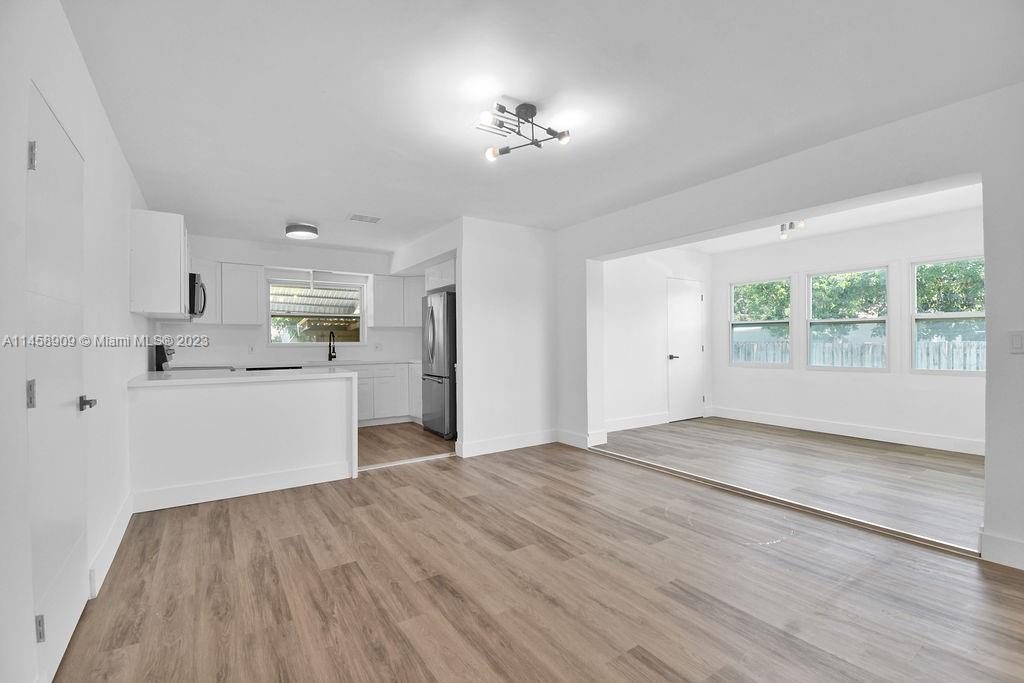 Beautiful four-bedroom, two-bathroom home in the heart of Hollywood. Spanning over 1,300 Sqft, this 