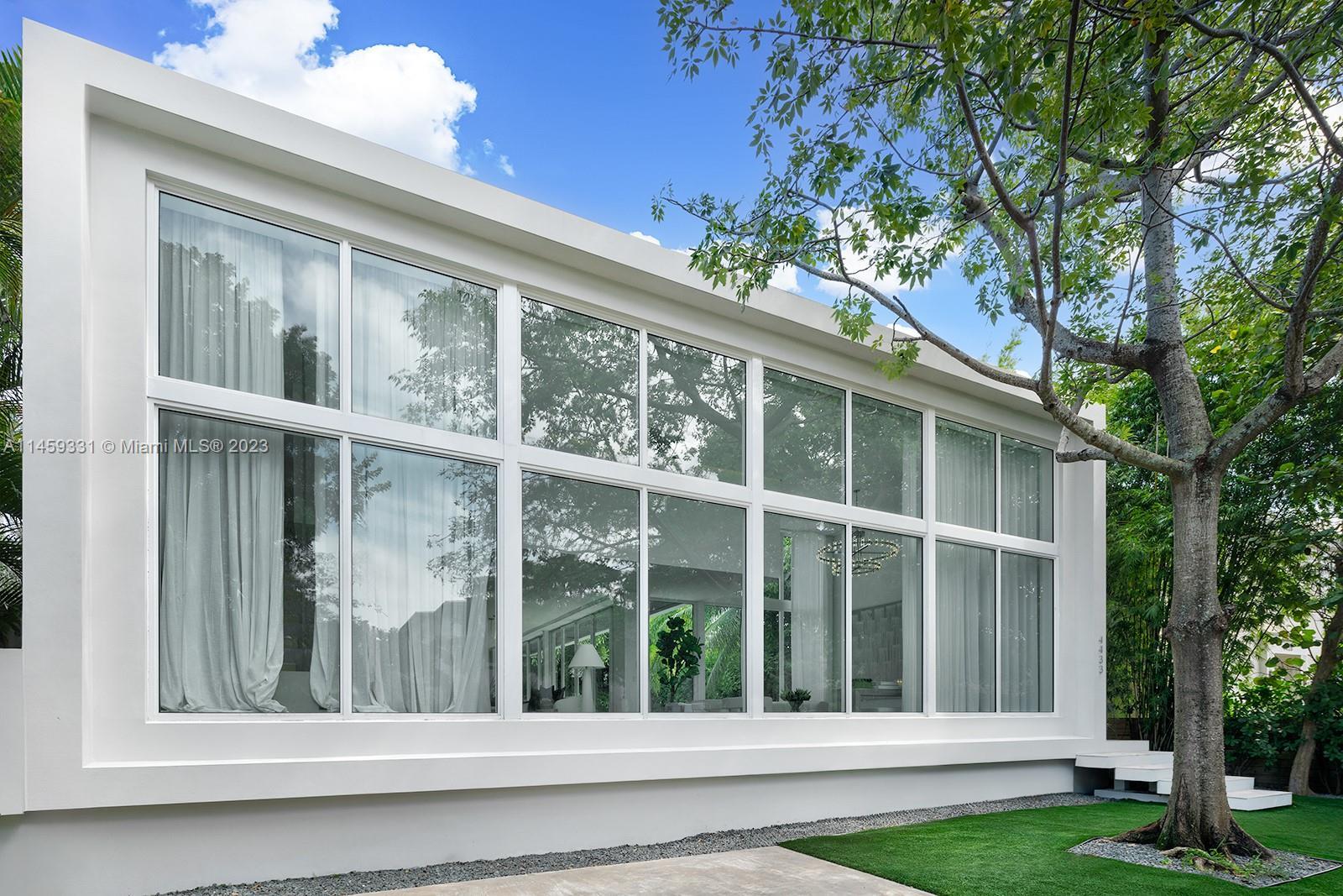 Step Inside With Me! Embraced by walls of glass, this ultra contemporary residence greets with 18' c
