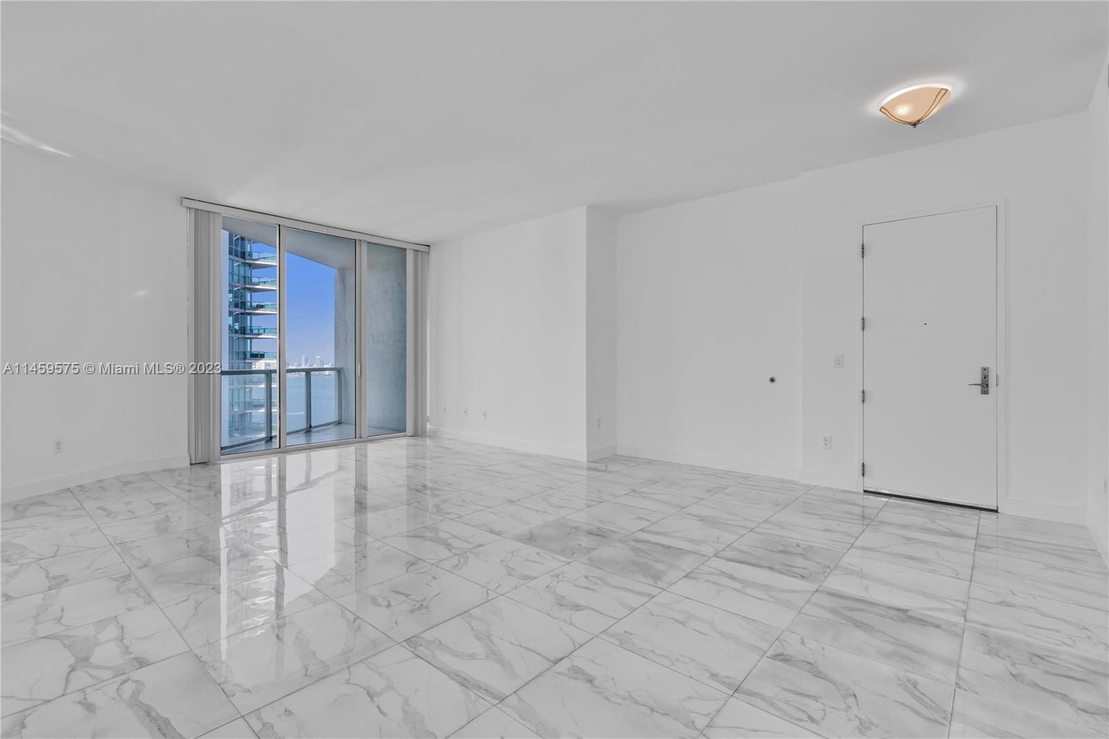 Luxury living awaits at this exquisite high-rise corner tower suite in the heart of Miami's prestigi