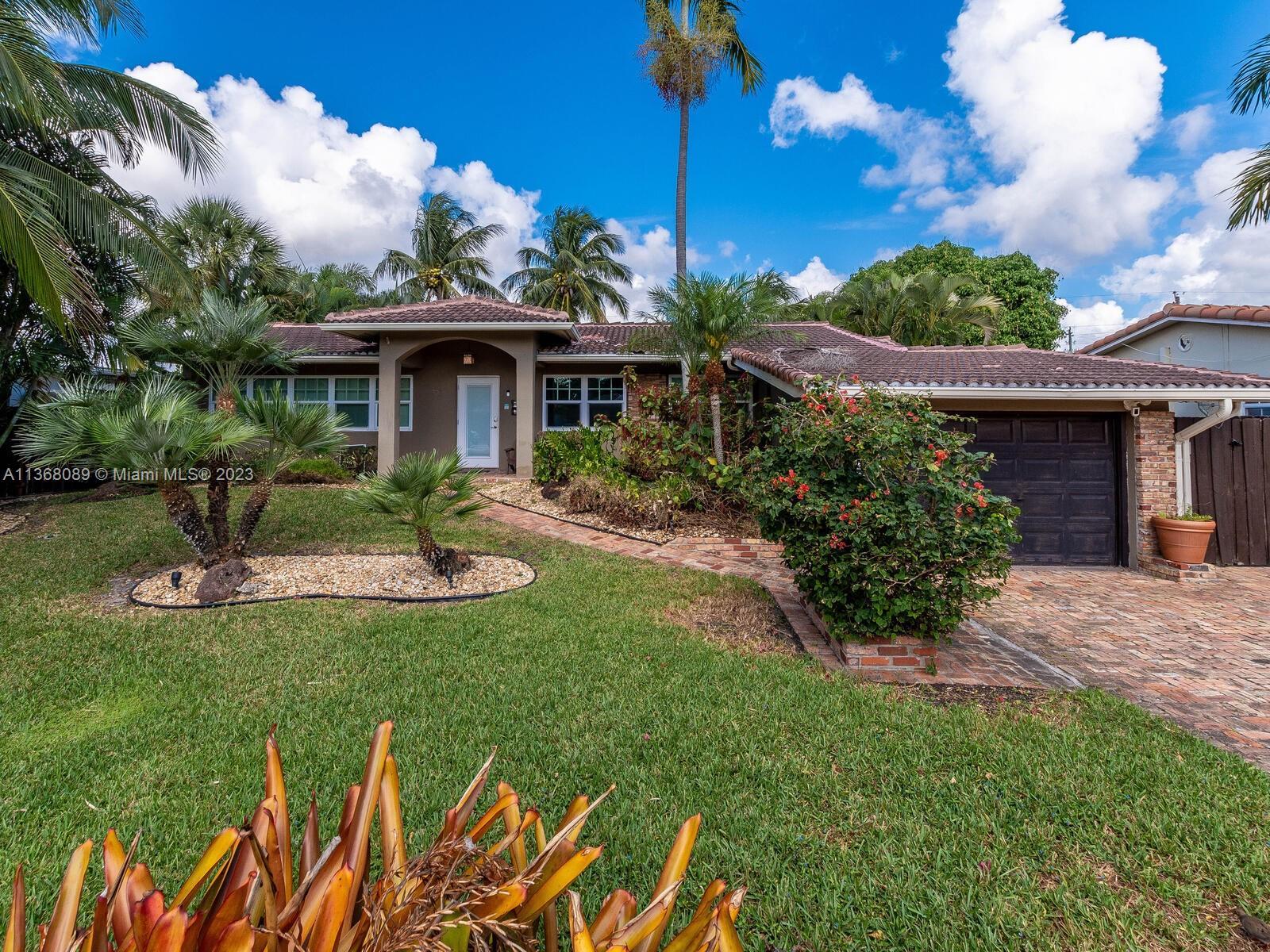 Beautiful upgraded 3 bed/2 bath home with Pool and Jacuzzi, Zen area with pond, and Professional Lan