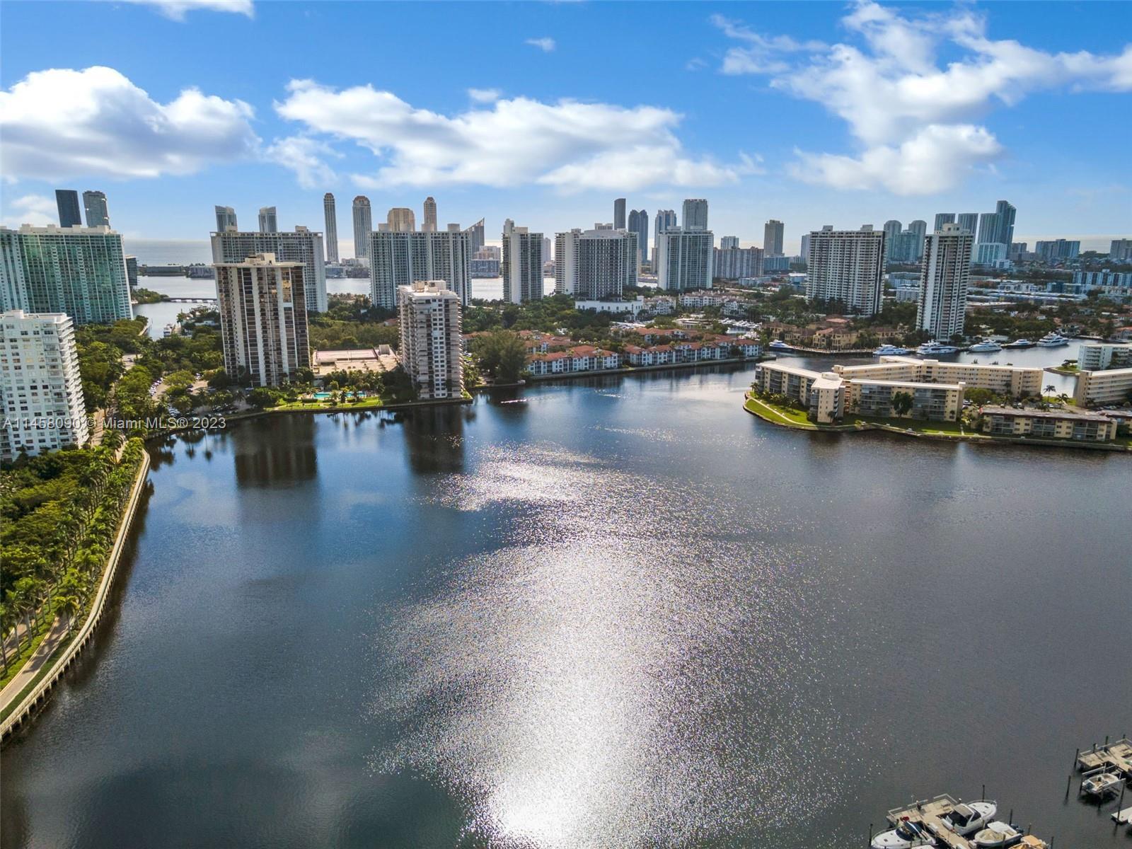 This stunning two-bed, two-bath waterfront corner unit condo in Aventura, offers the epitome of luxu