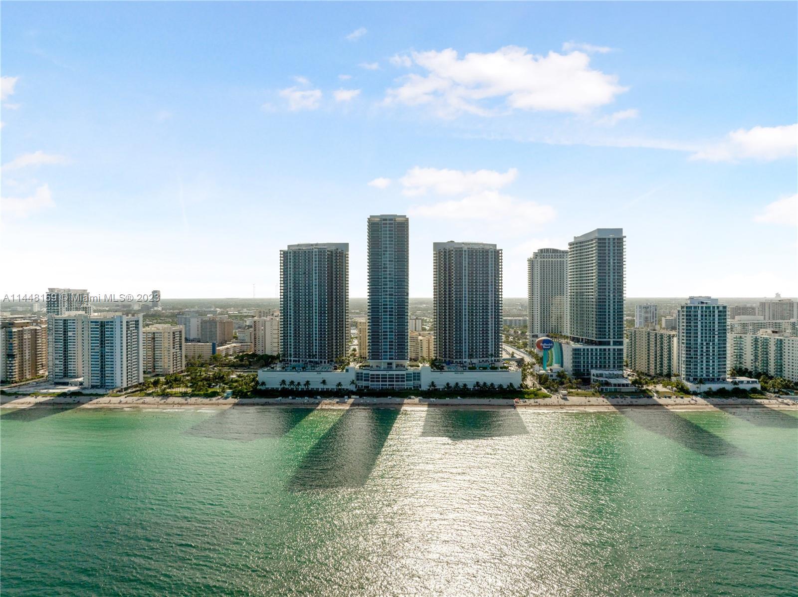 LUXURIOUS CORNER UNIT ON THE 38TH FLOOR WITH BREATHTAKING OCEAN, INTRACOASTAL, & CITY VIEWS! PREMIER
