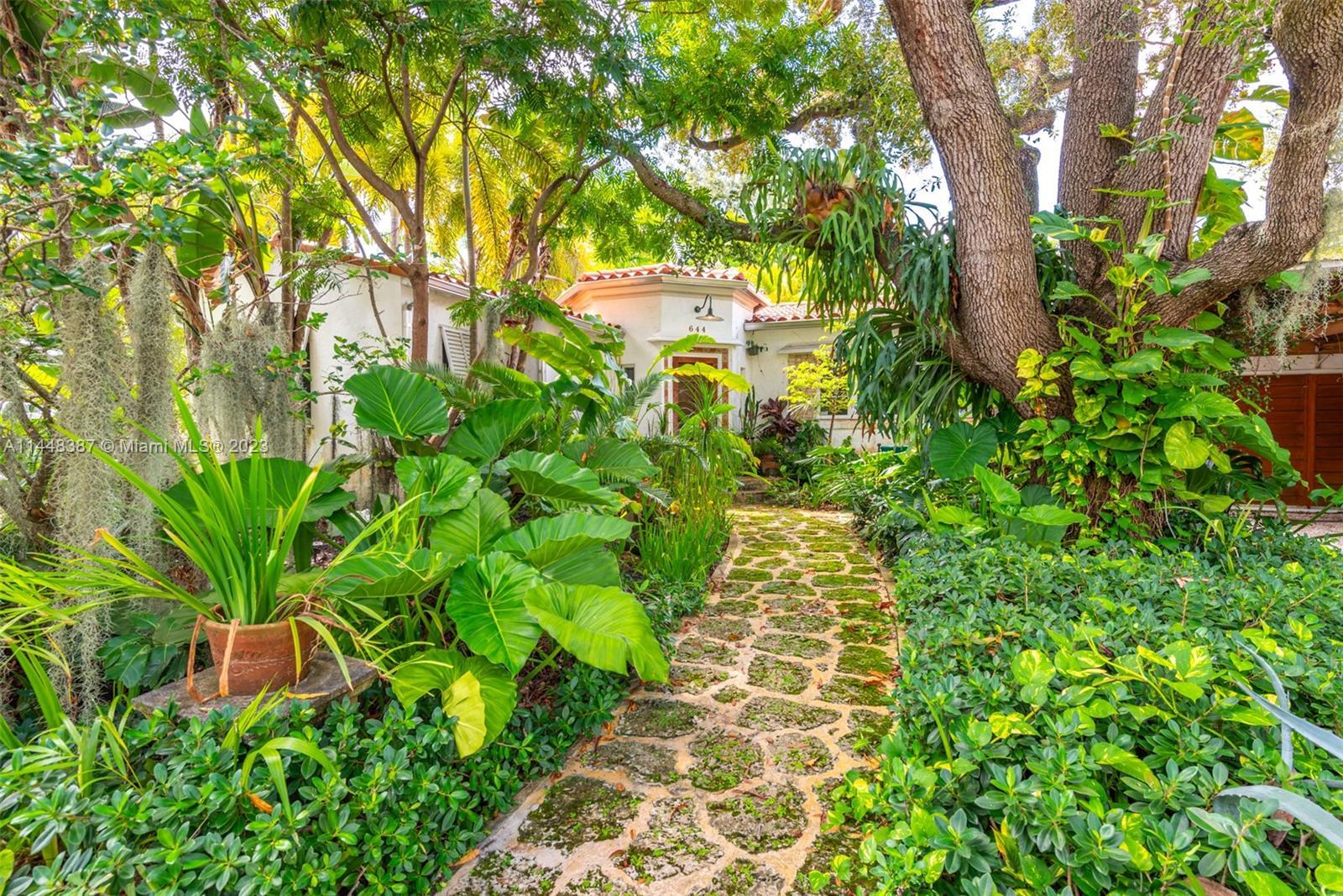 Nestled on idyllic 57th Street in historic Morningside, just one block from Biscayne Bay and two blo