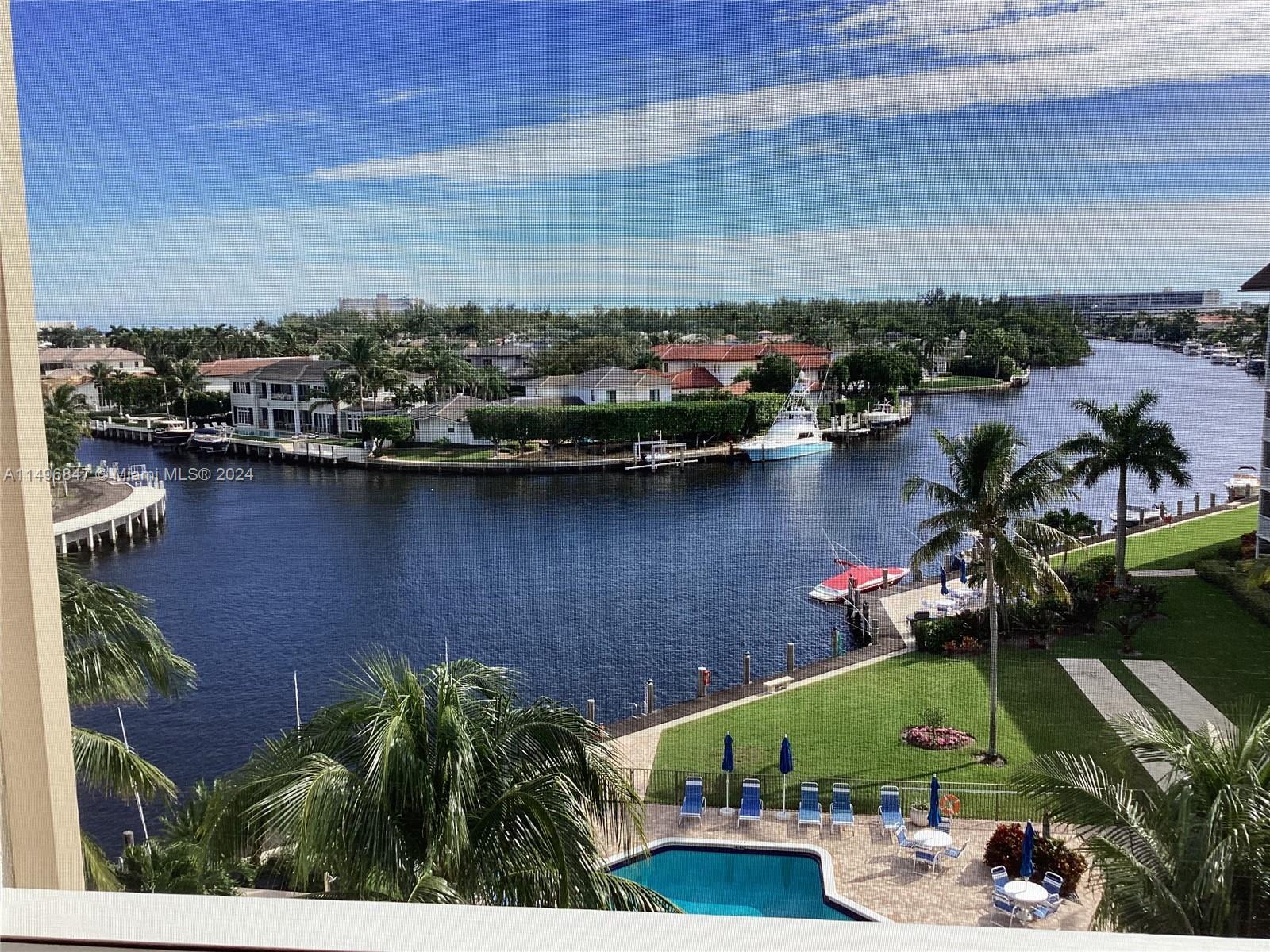 MOST SPECTACULAR WATER VIEWS AND MANSIONS OF ROYAL PALM  AS SOON AS YOU WALK IN.  2/2 TOP FLOOR COND