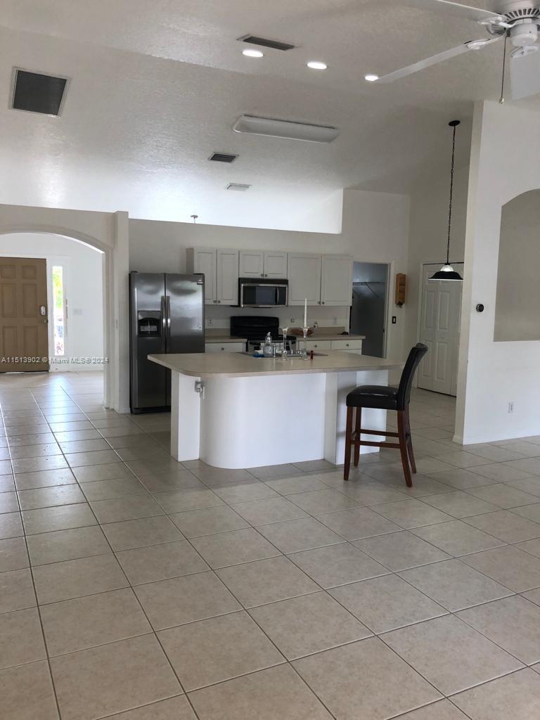 Photo of 6456 NW Flair St in Port St Lucie, FL