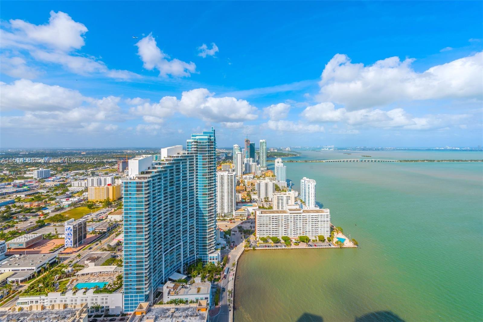 Welcome to your residence-in-the-sky in Quantum on the Bay! Enjoy breathtaking D-I-R-E-C-T bay views
