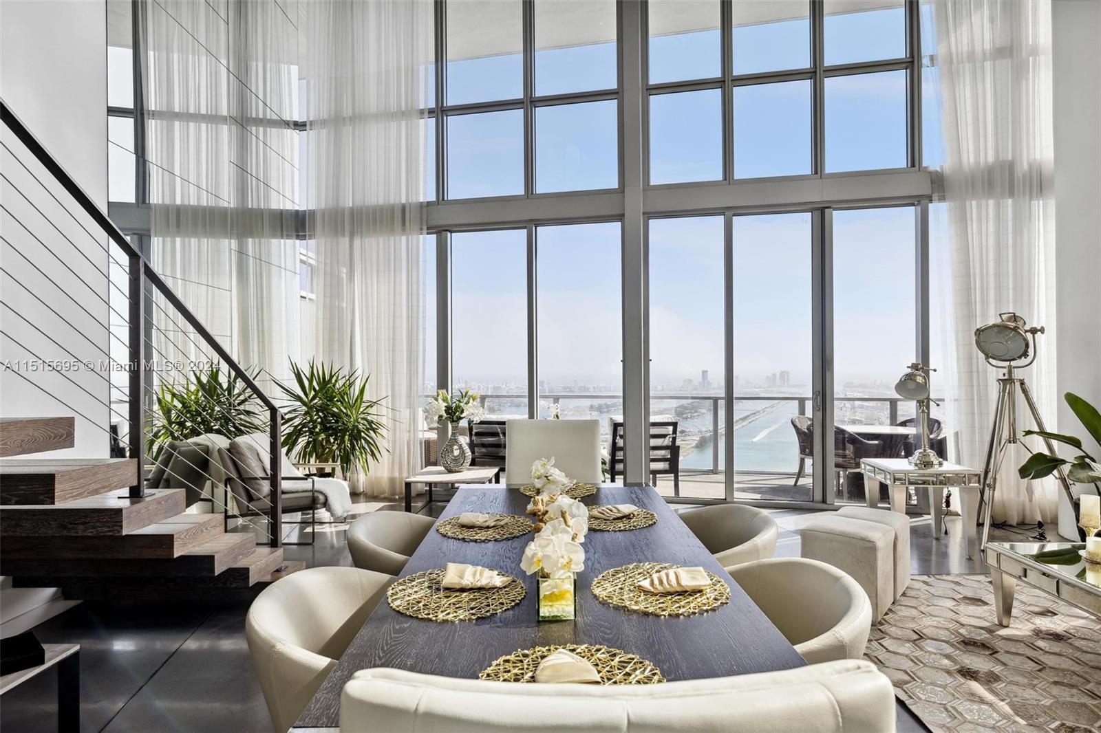 This exceptional 3-level penthouse, perched on the 63rd floor, features 3 bedrooms and 4.5 bathrooms