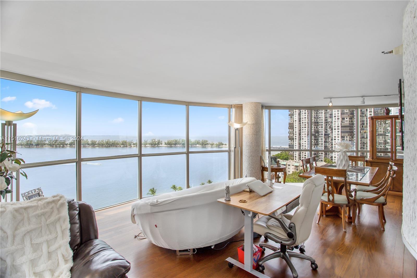 Prepare to be mesmerized by breathtaking 180-degree views of Biscayne Bay, visible through stunning 