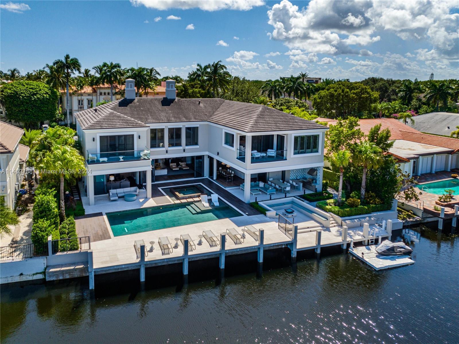 Enjoy this contemporary two-story home with over 100+ feet on the water. 
The Sanctuary, distinguis