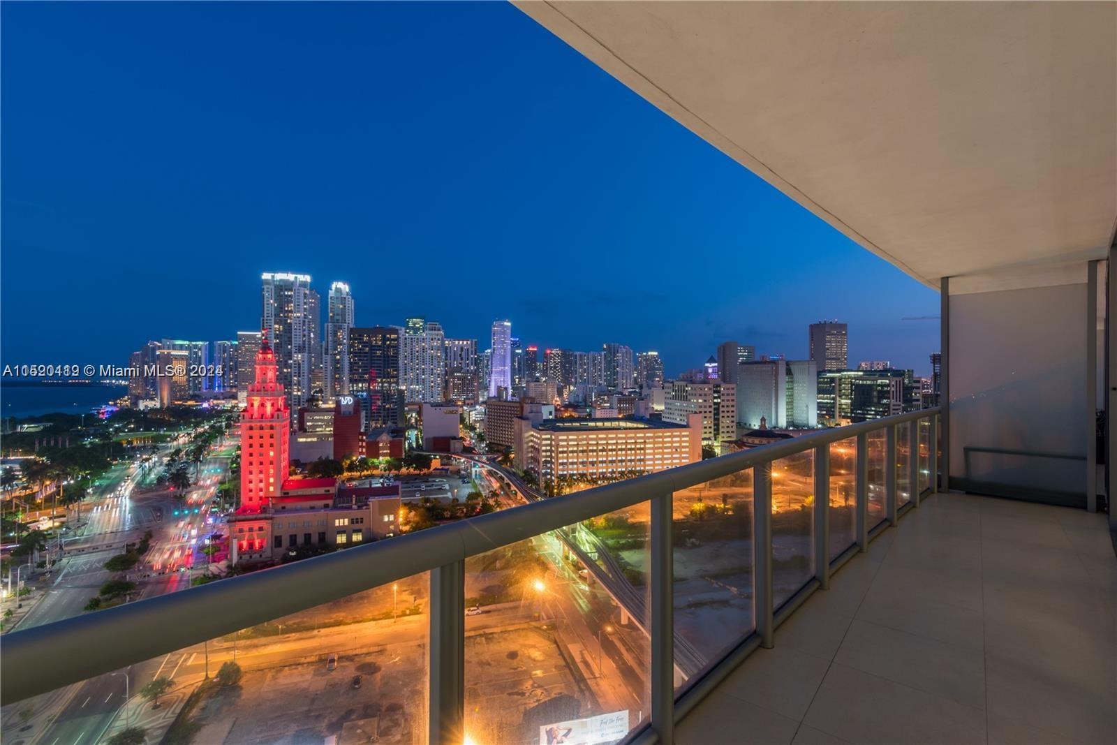 Experience breathtaking city and bayfront panoramas from this sensational condominium nestled in the
