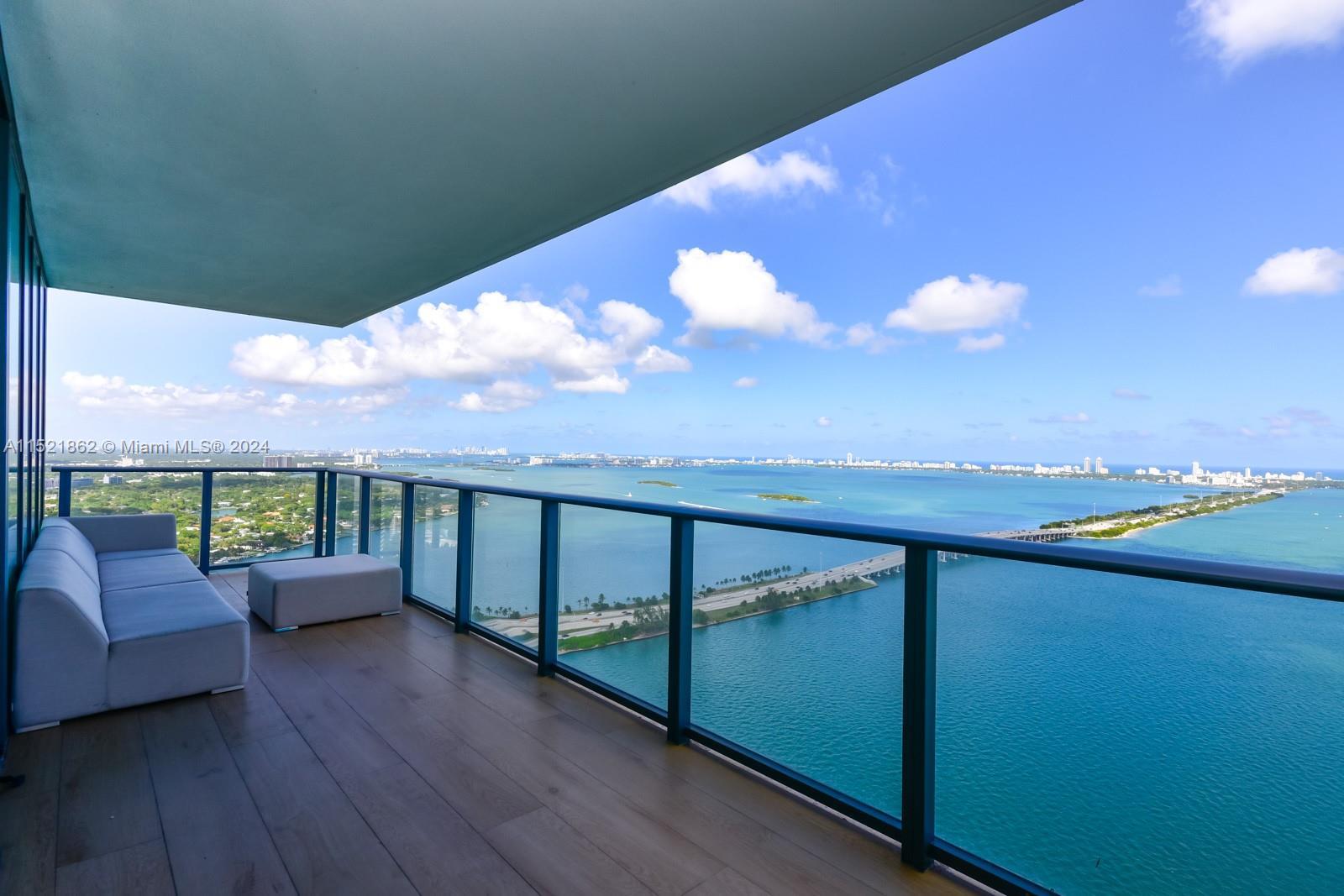 Spectacular corner unit at One Paraiso with unobstructed views of Biscayne Bay. This 3 bedroom, 3.5 