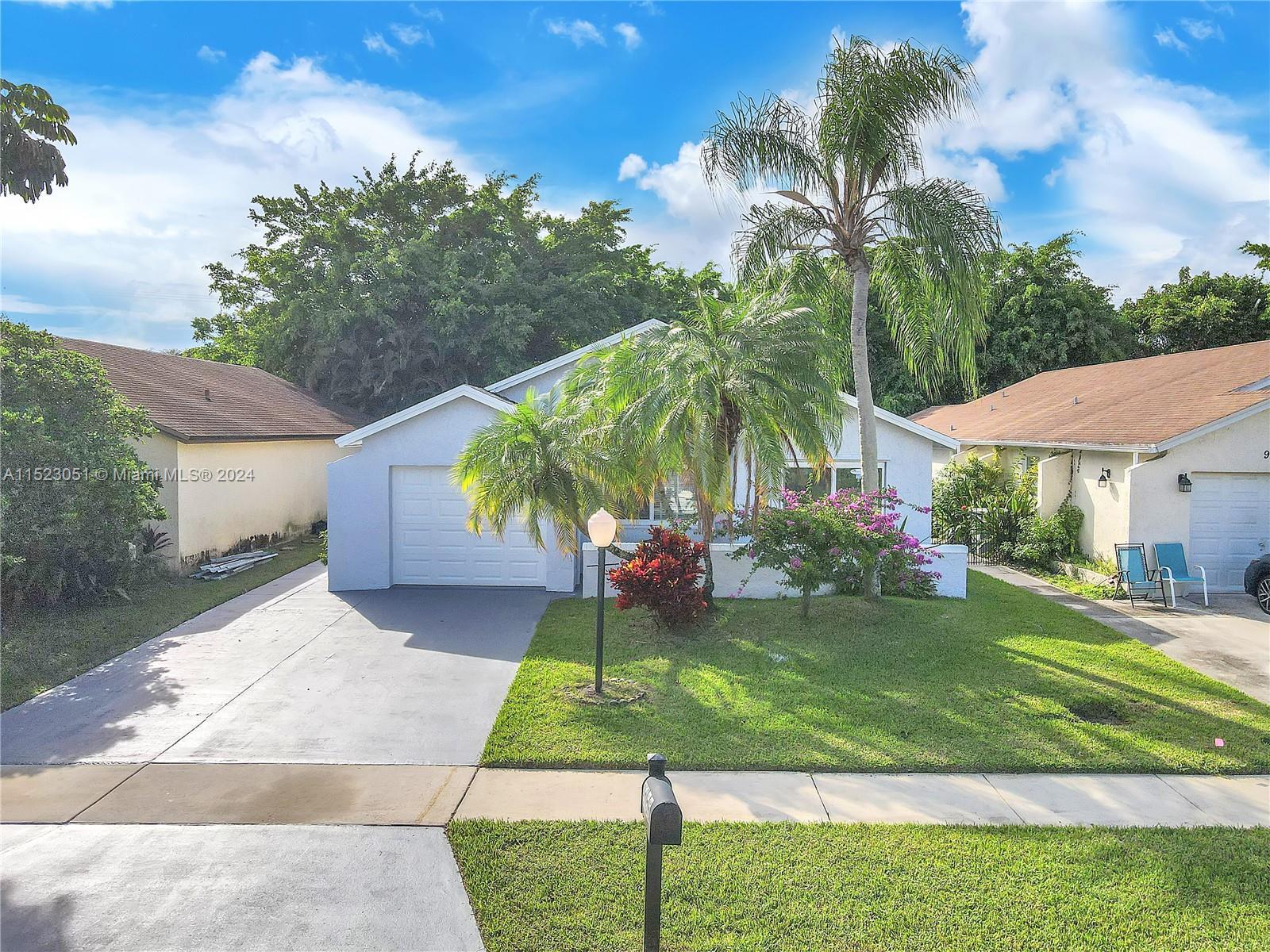 Elegant and spacious home in the exclusive community of Pine Springs in quiet West Boca Raton. Come 