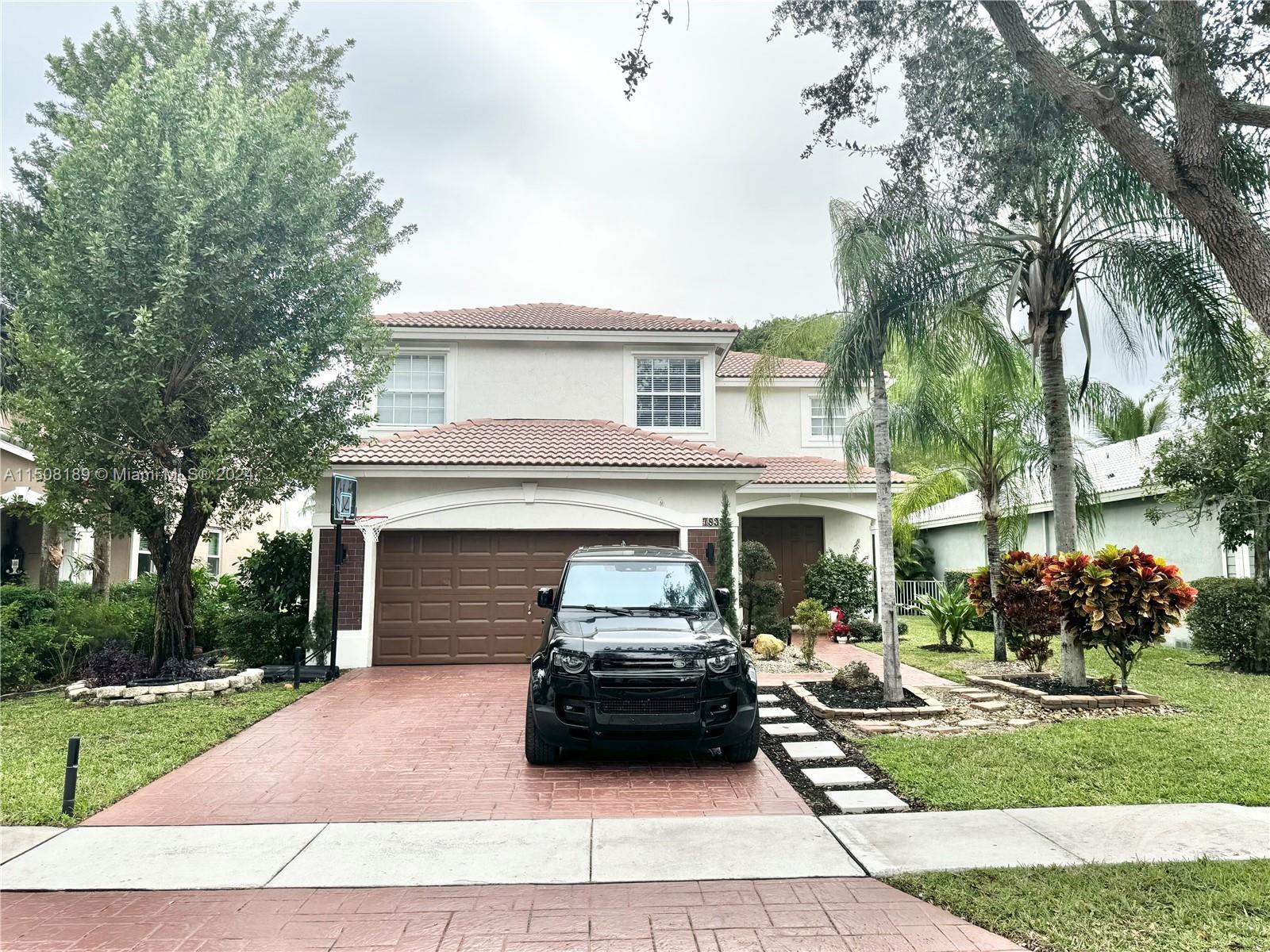 Photo of 7833 NW 70th Ave in Parkland, FL