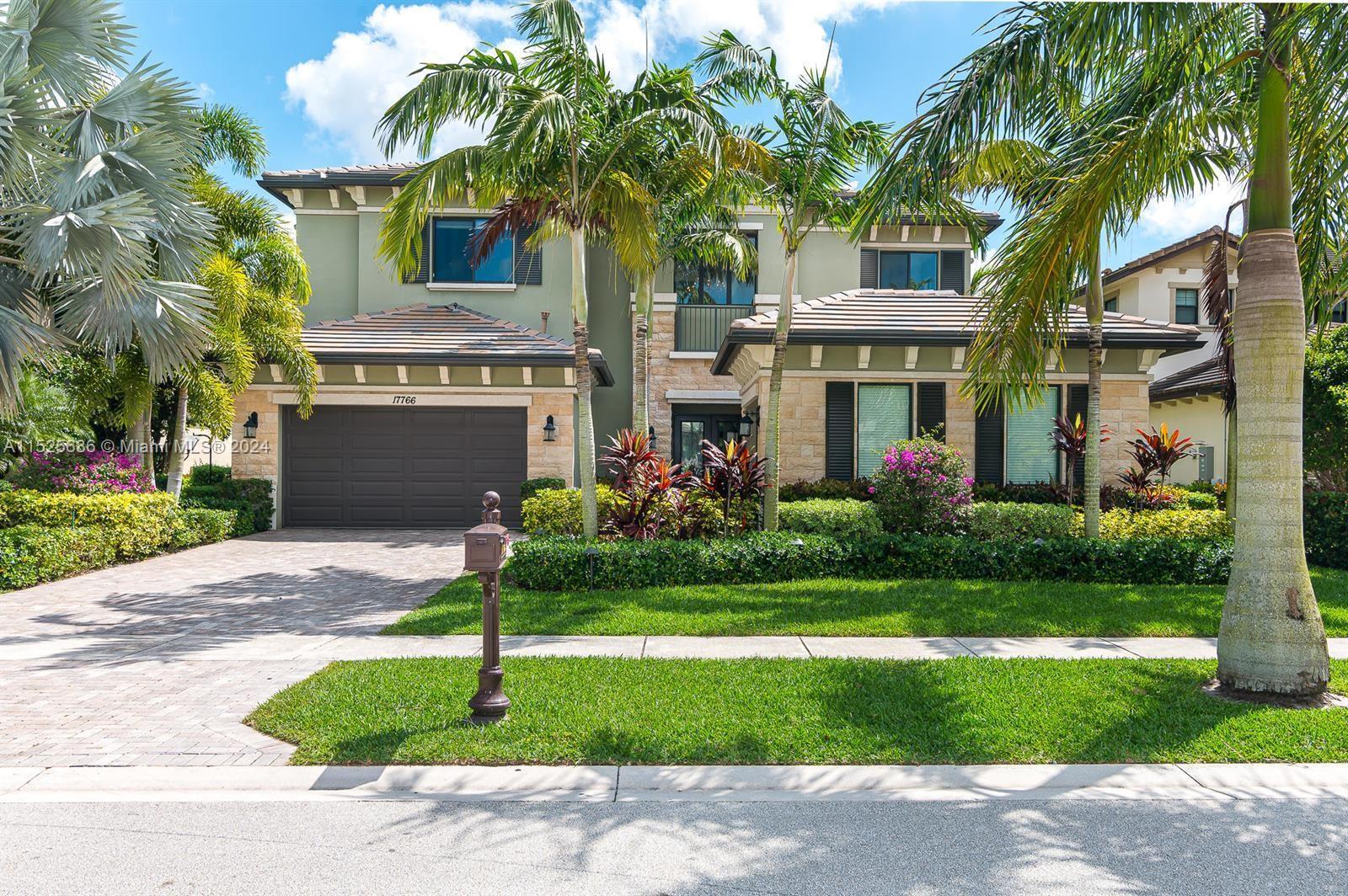A RARE OPPORTUNITY TO OWN A HIGHLY DESIRABLE AVONDALE MODEL IN ONE OF BOCA'S MOST PRESTIGIOUS NEIGHB