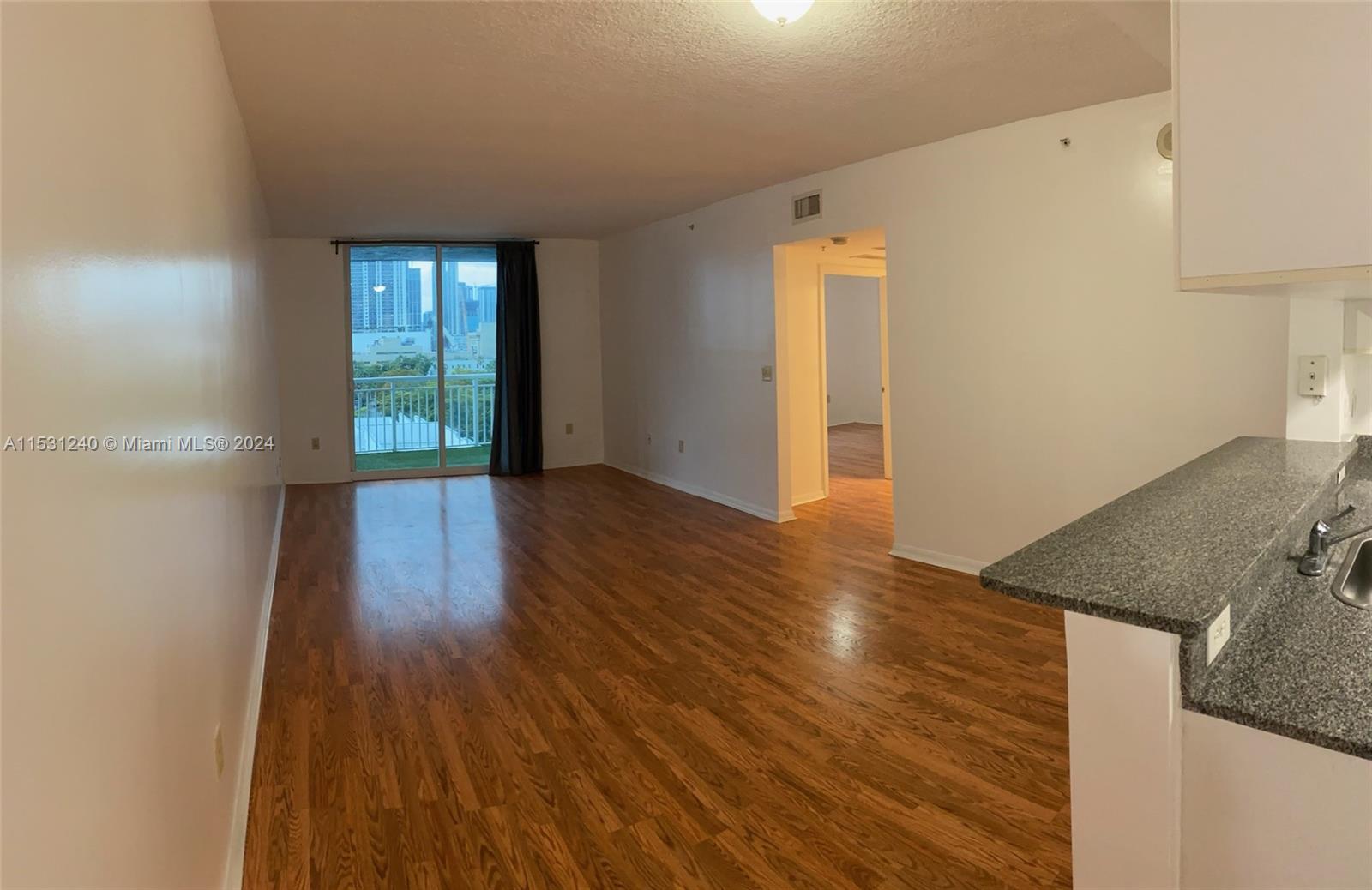 Spacious 2/2 Corner unit. Great Location right on Biscayne Blvd. Offers granite countertops, ample v