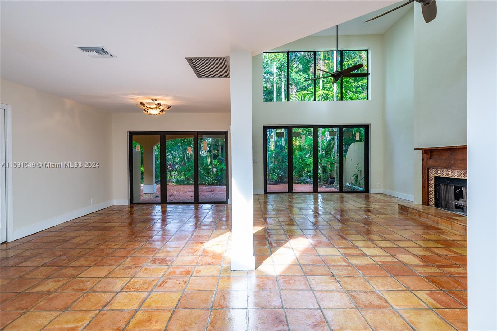 Spacious & bright home in prestigious Boca Pointe. Sun-filled private home has vaulted ceilings & sk