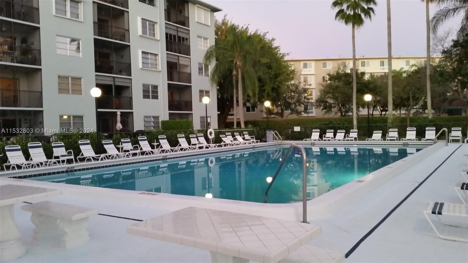 Beautiful large 2 bedrooms and 2 baths Corner Condominium with great view of Pool and Lake in Quiet 