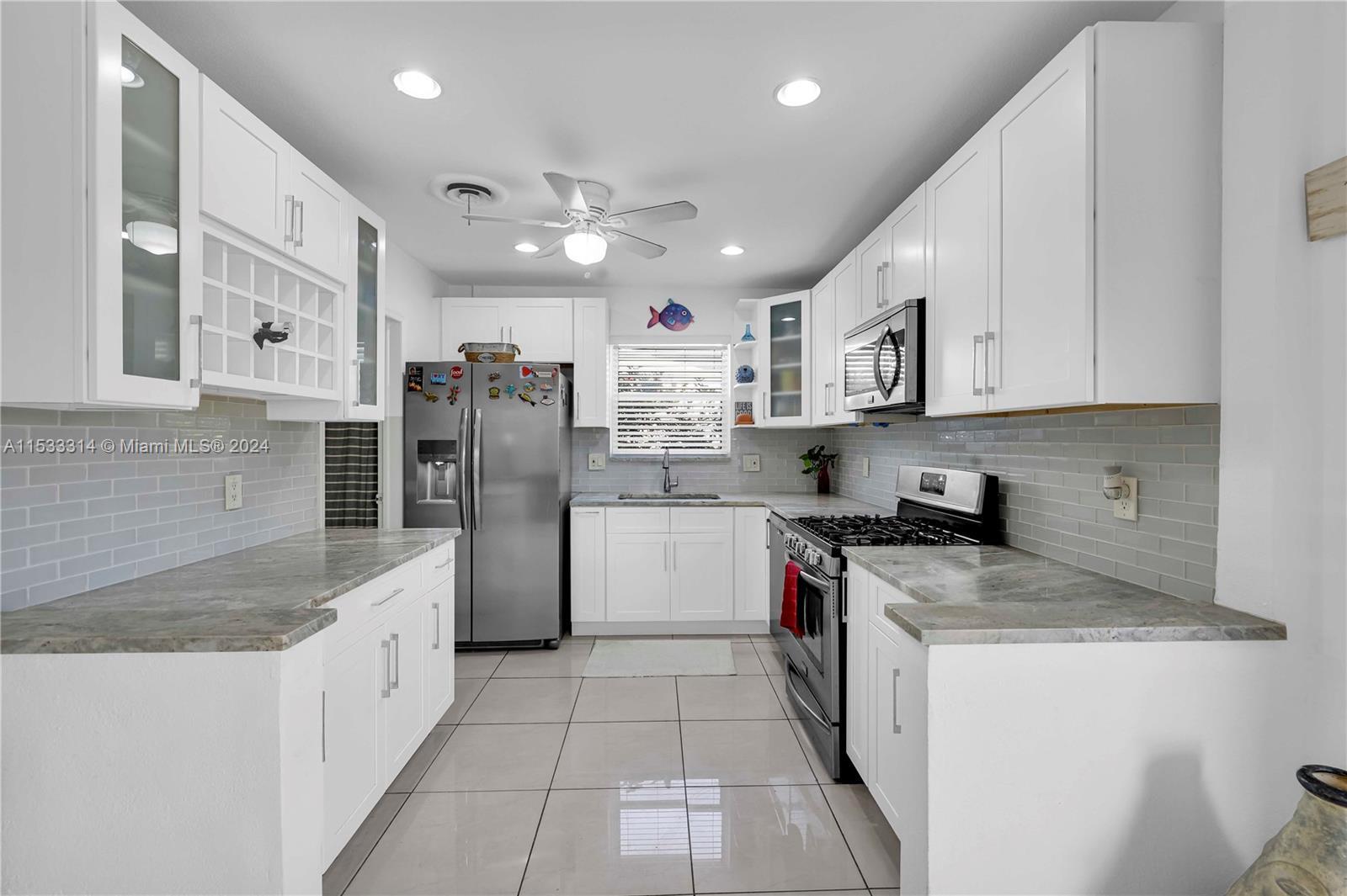 Beautiful 2/1 single family home with pool and deck in a great area of Hollywood Florida, with 8ft f