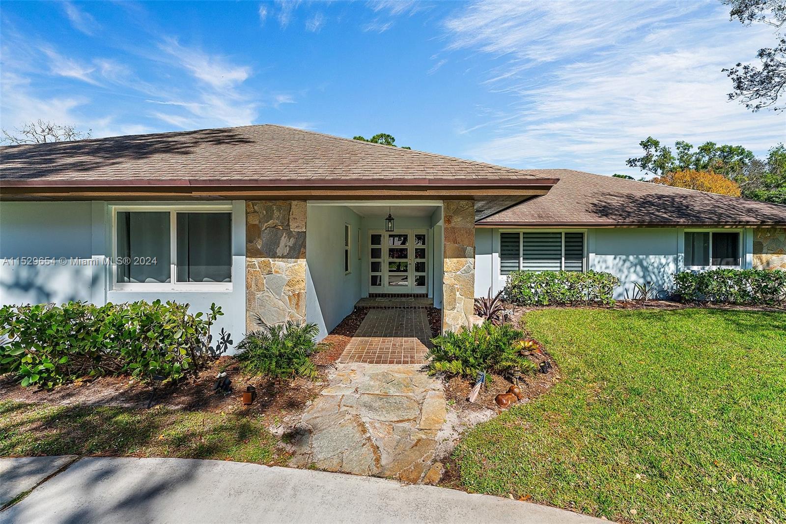 Welcome to your own slice of Paradise in sunny South Florida! This charming single story home offers