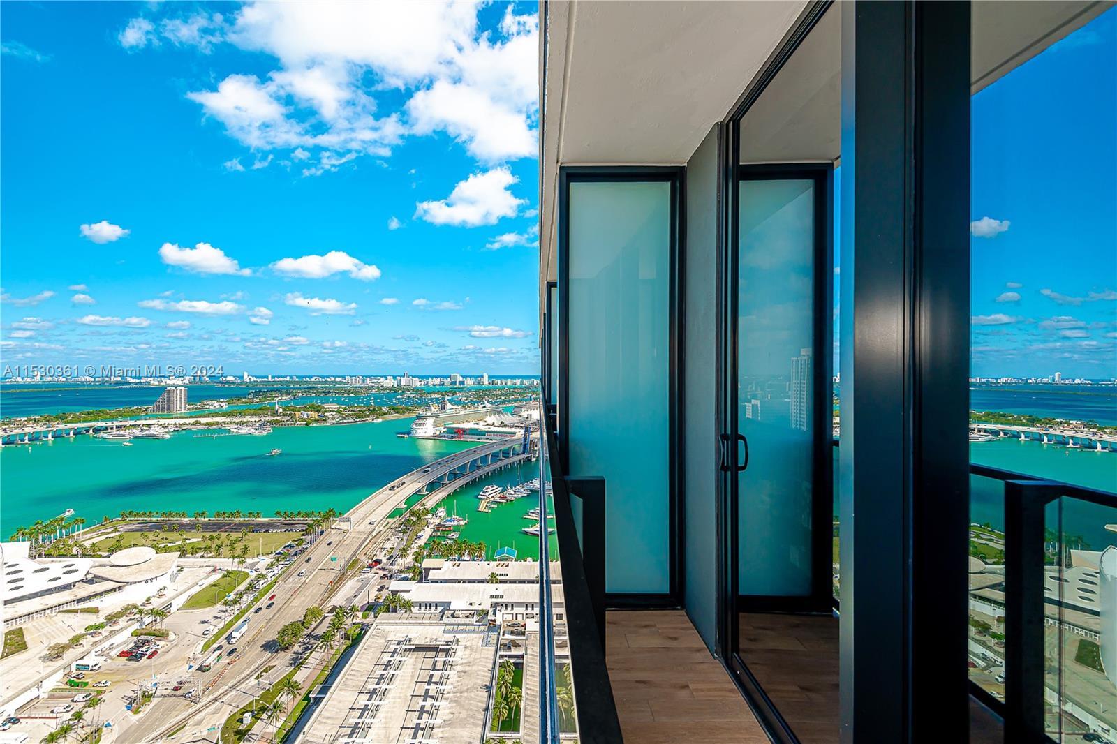 Experience luxury living with breathtaking views of Biscayne Bay and Downtown Miami in this brand ne