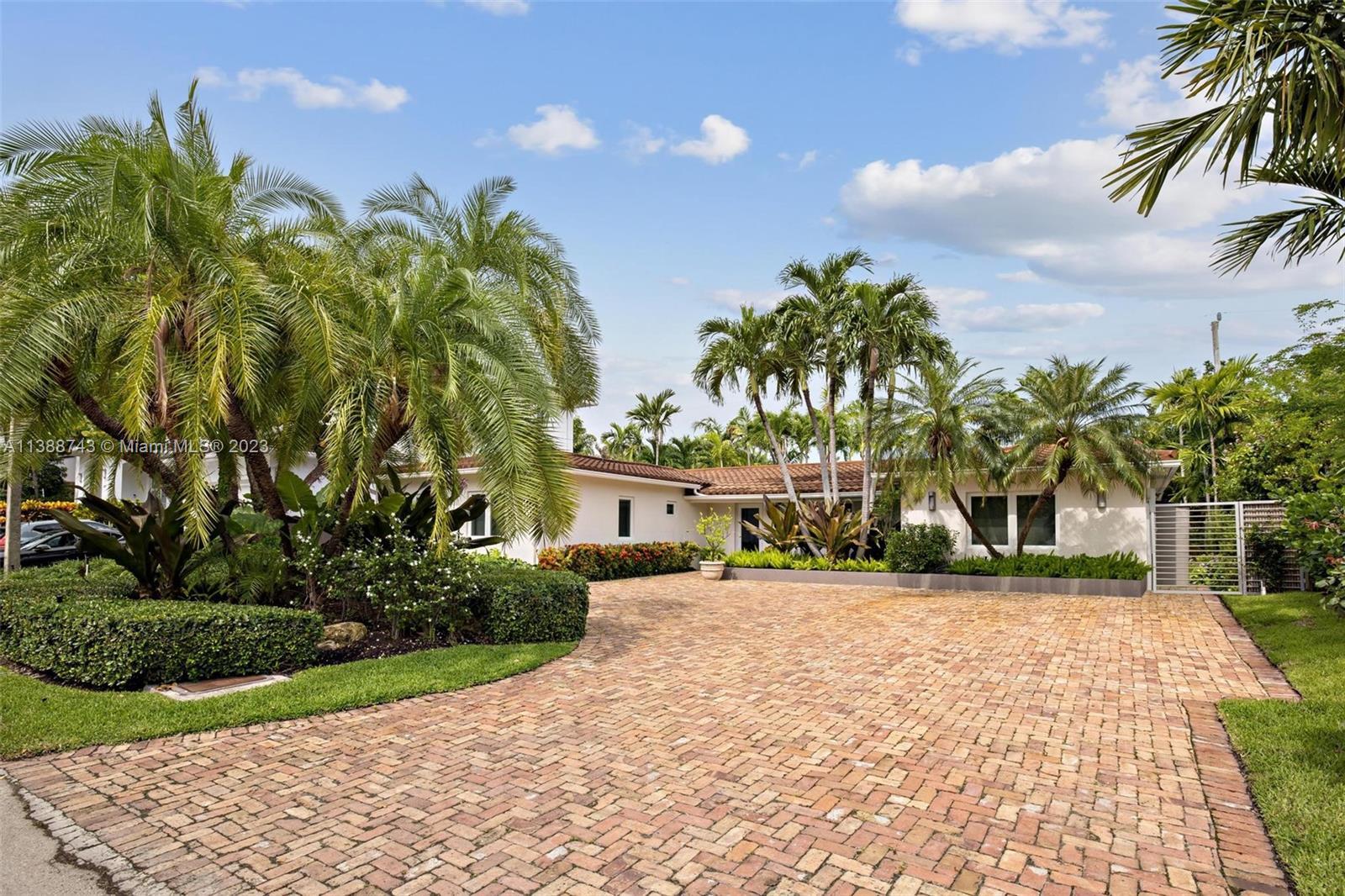 Welcome to this exceptional residence located in the prestigious Key Biscayne community. This magnif