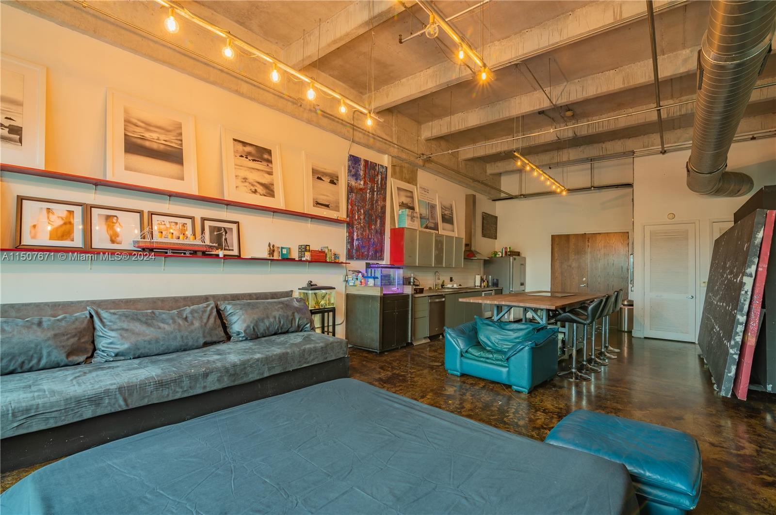 Gorgeous NY Style Industrial Loft with lots of charm! Soaring 20' celings with lots of storage! All 