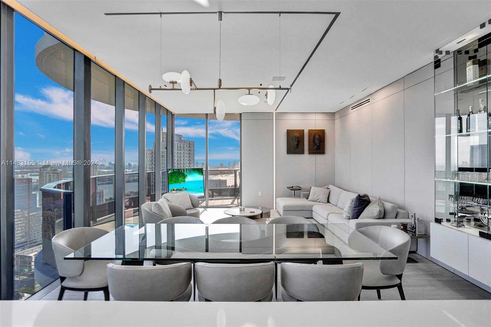 Welcome to Brickell Flatiron. This corner penthouse residence boasts breathtaking views of the city 