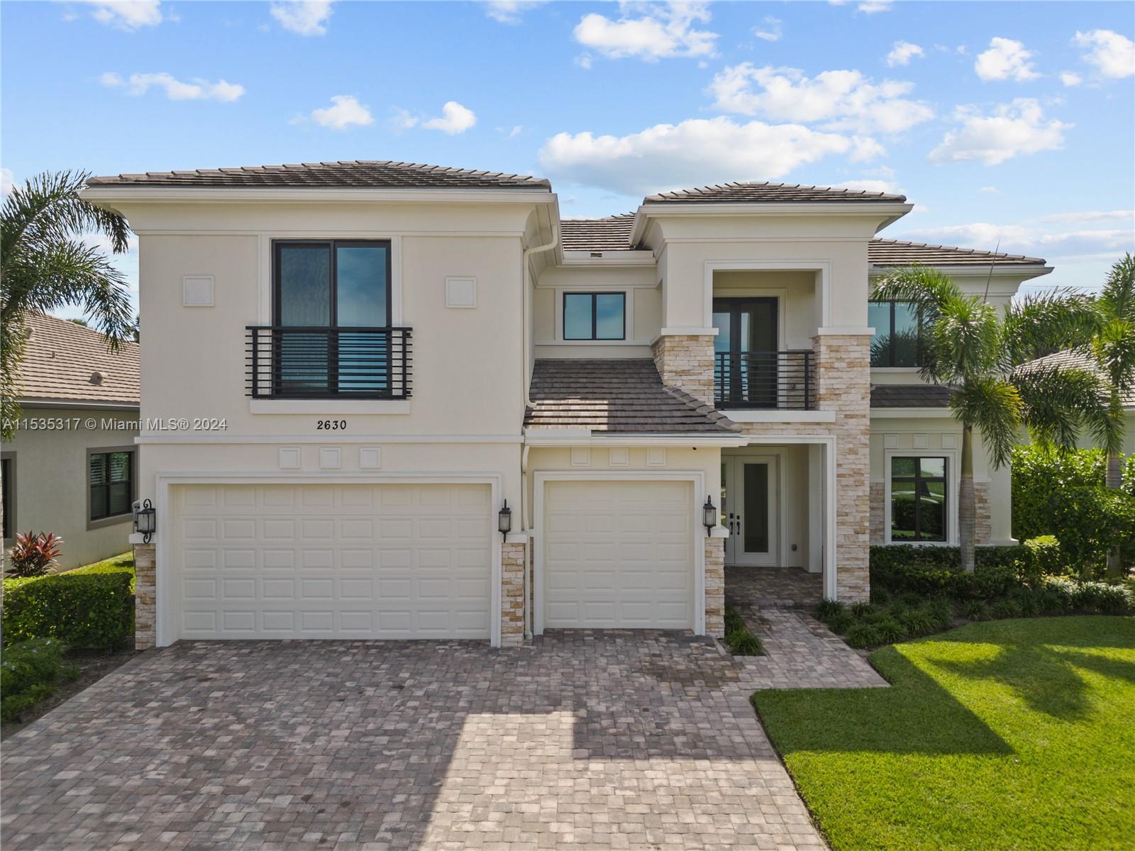 Royal Palm Polo community in Boca Raton. Sited on a southern lot, this spacious Callahan model, it o