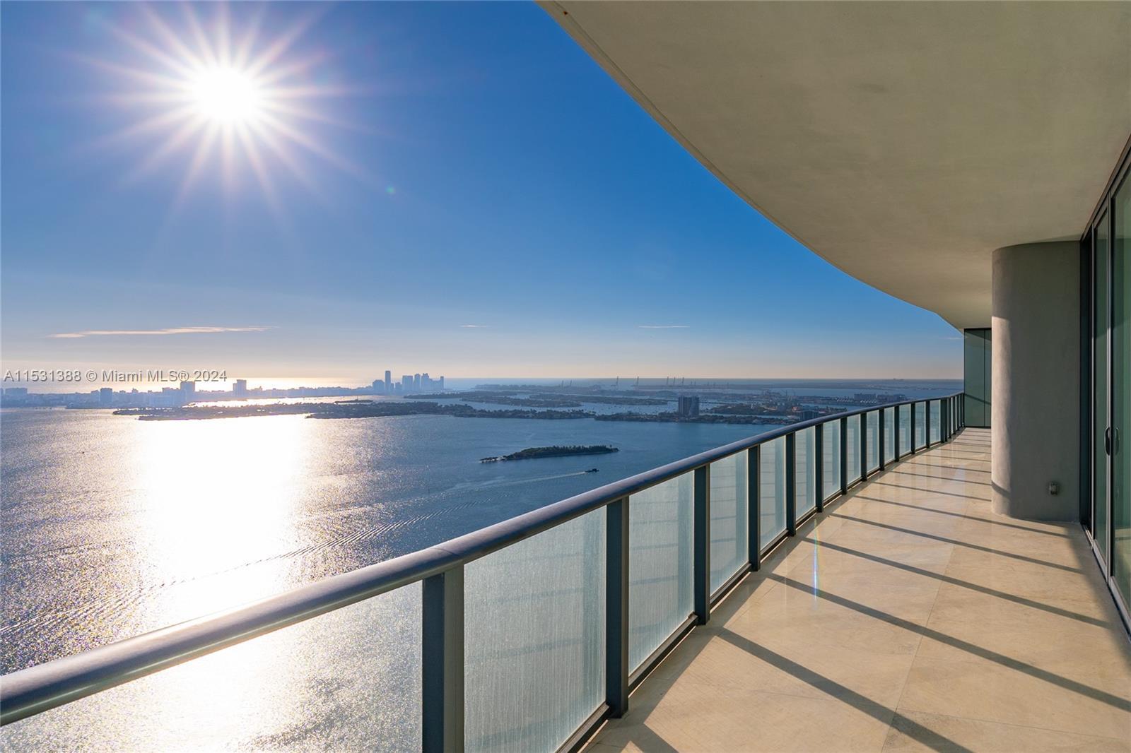 This breathtaking Penthouse on the 50th floor boasts endless Ocean and Bay views, epitomizing the es
