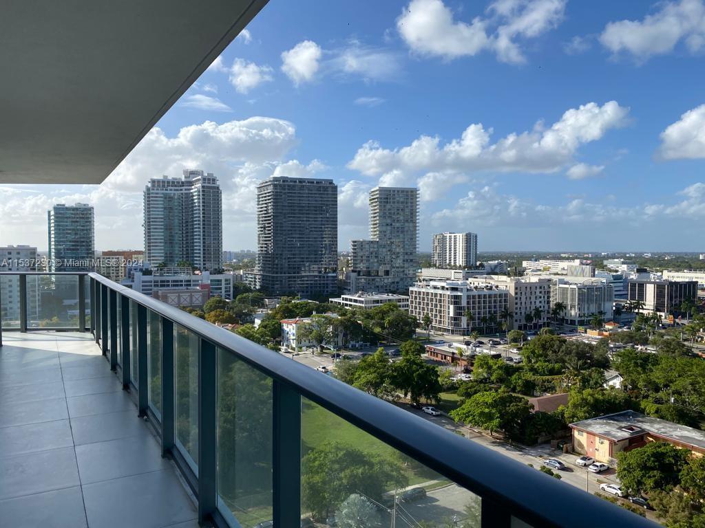 Located in Edgewater, this 2-bed/2-bath condo boasts floor-to-ceiling windows and a balcony that pro