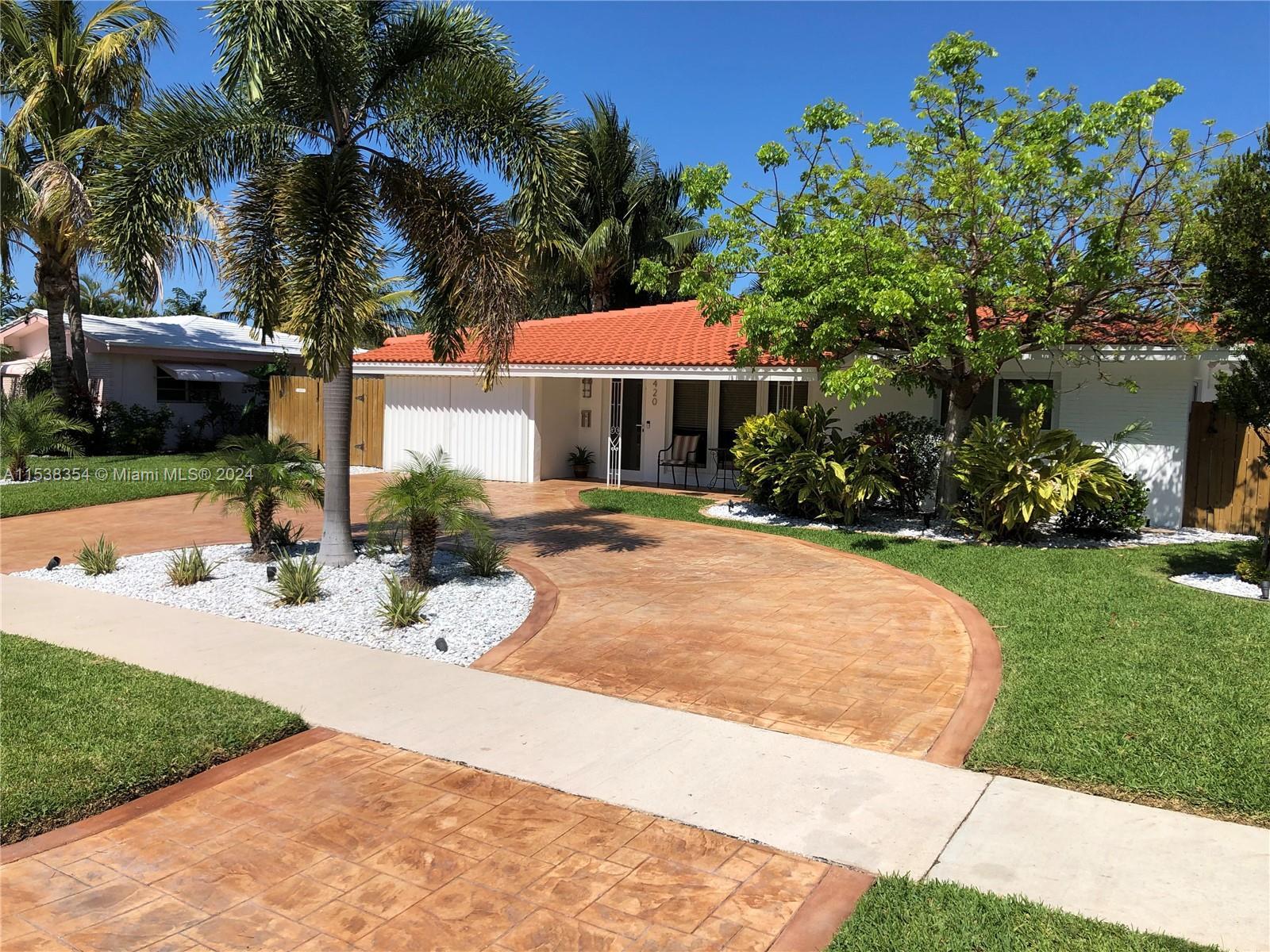 Come visit this incredible home in Pompano Beach in the much sought after COASTAL COMMUNITY of Garde