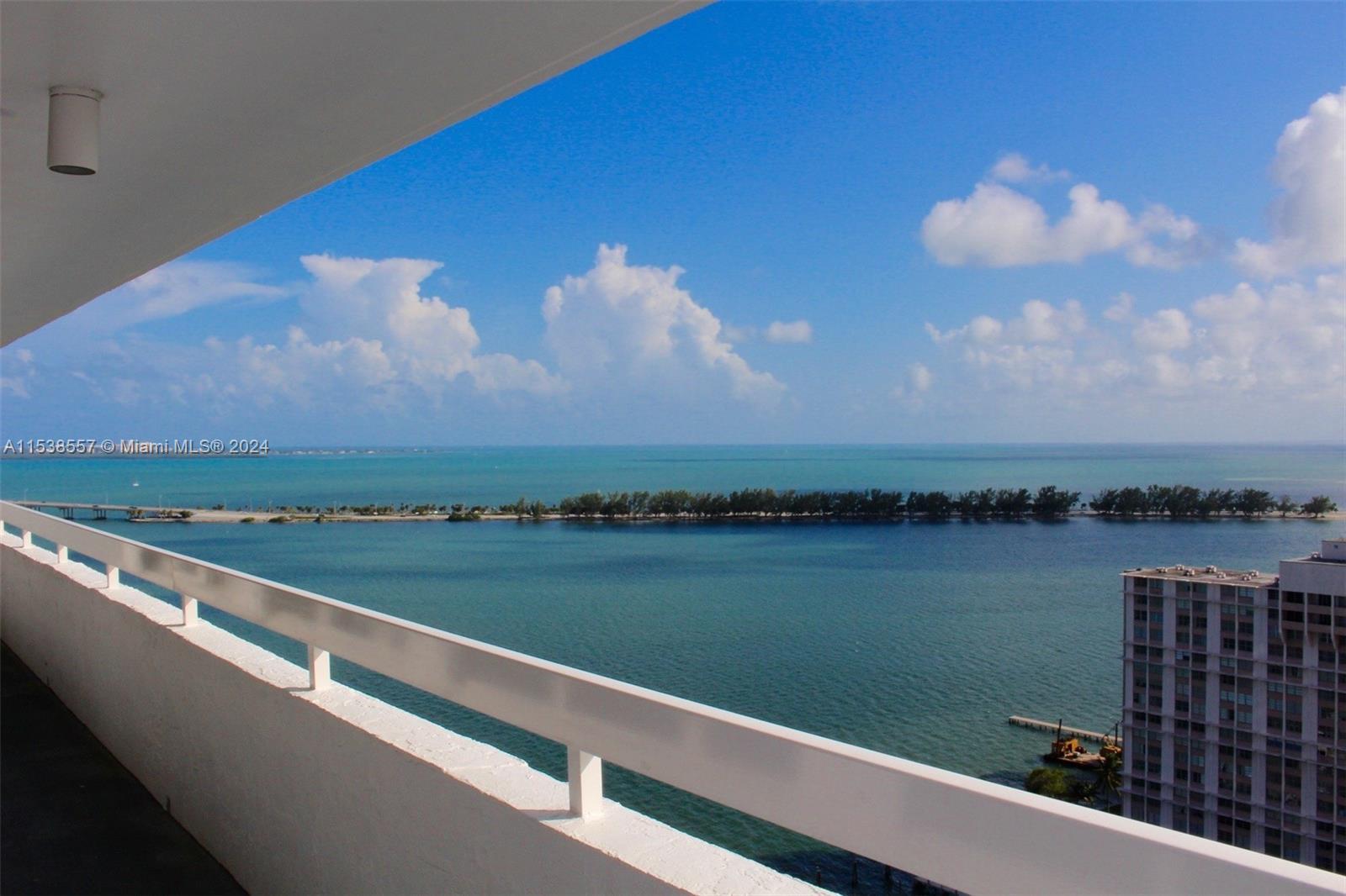 Luxury Waterfront Building, floor-to-ceiling glass provides a beautiful wide open view of Key Biscay