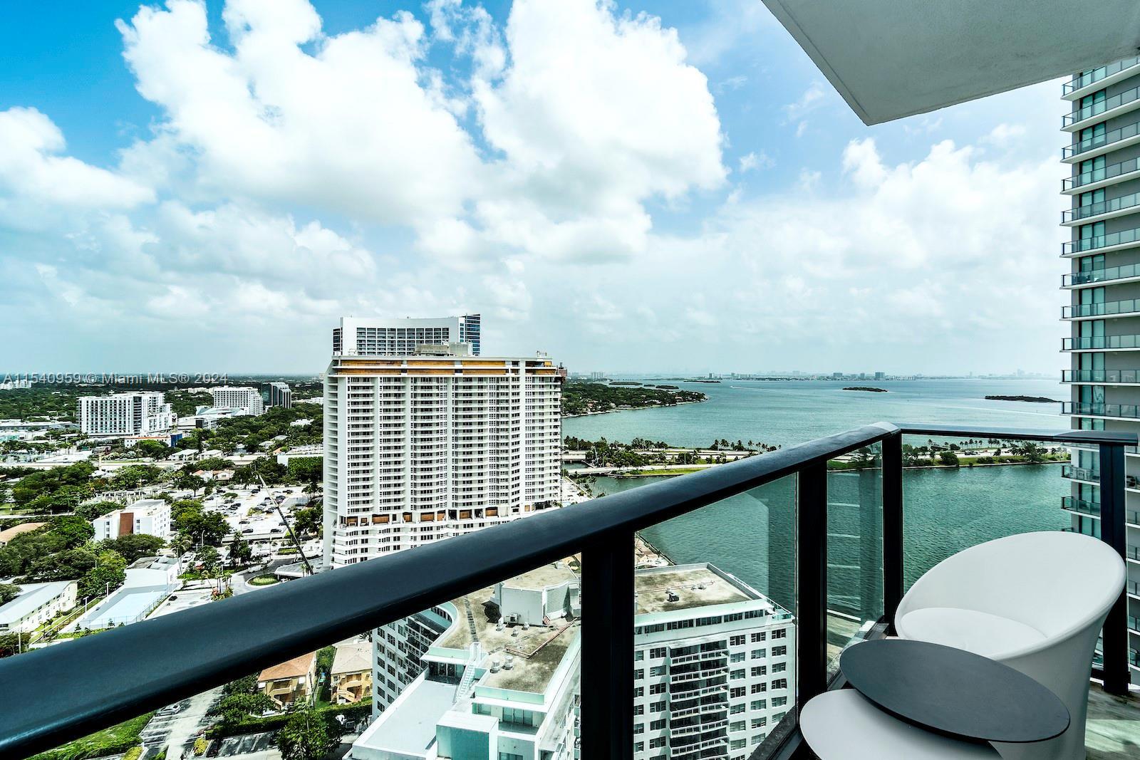 Beautiful corner residence with an abundance of natural light, and beautiful views of the Biscayne B