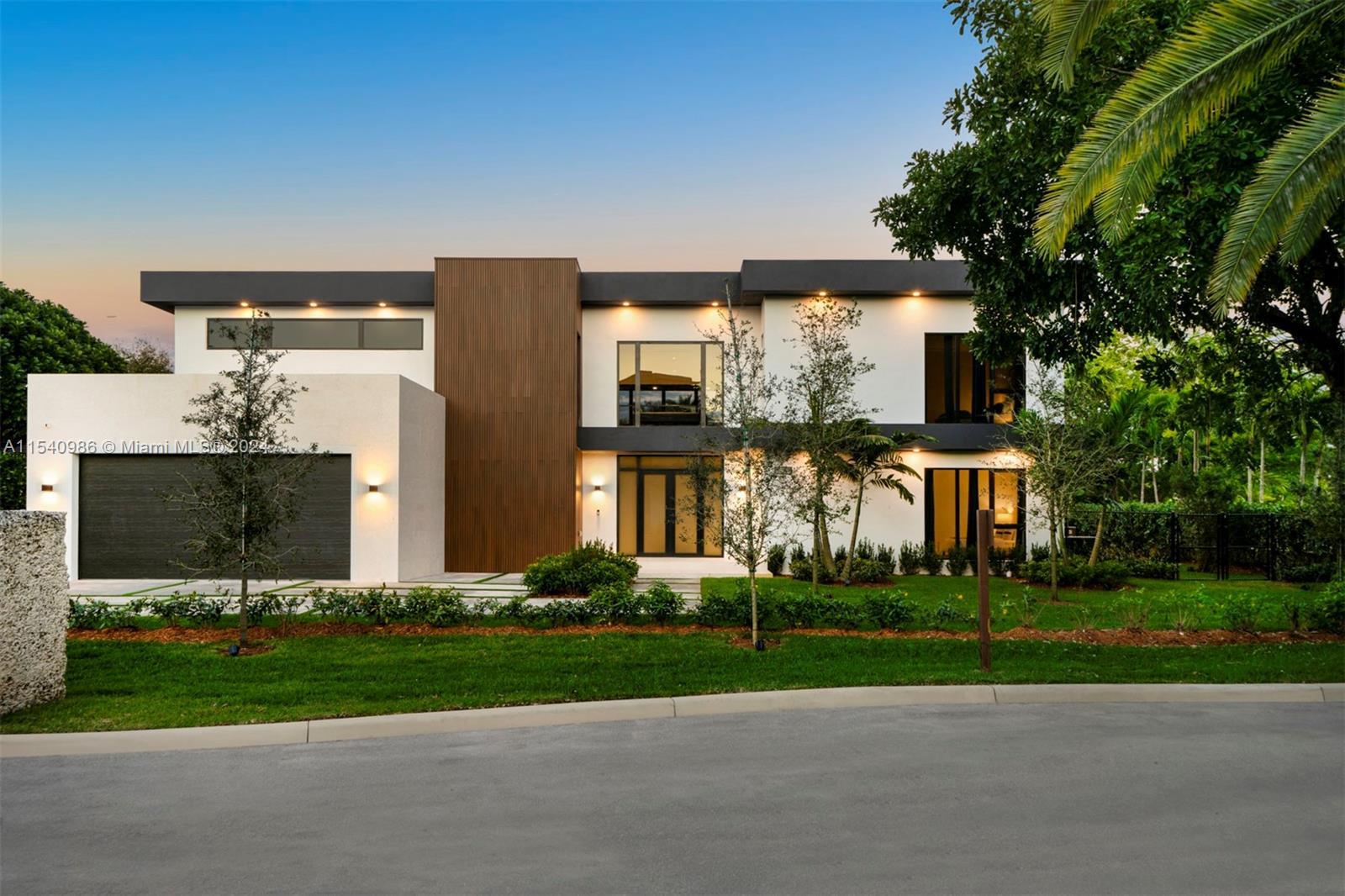 In a tranquil cul-de-sac, this new contemporary corner home offers an airy, open layout with high ce