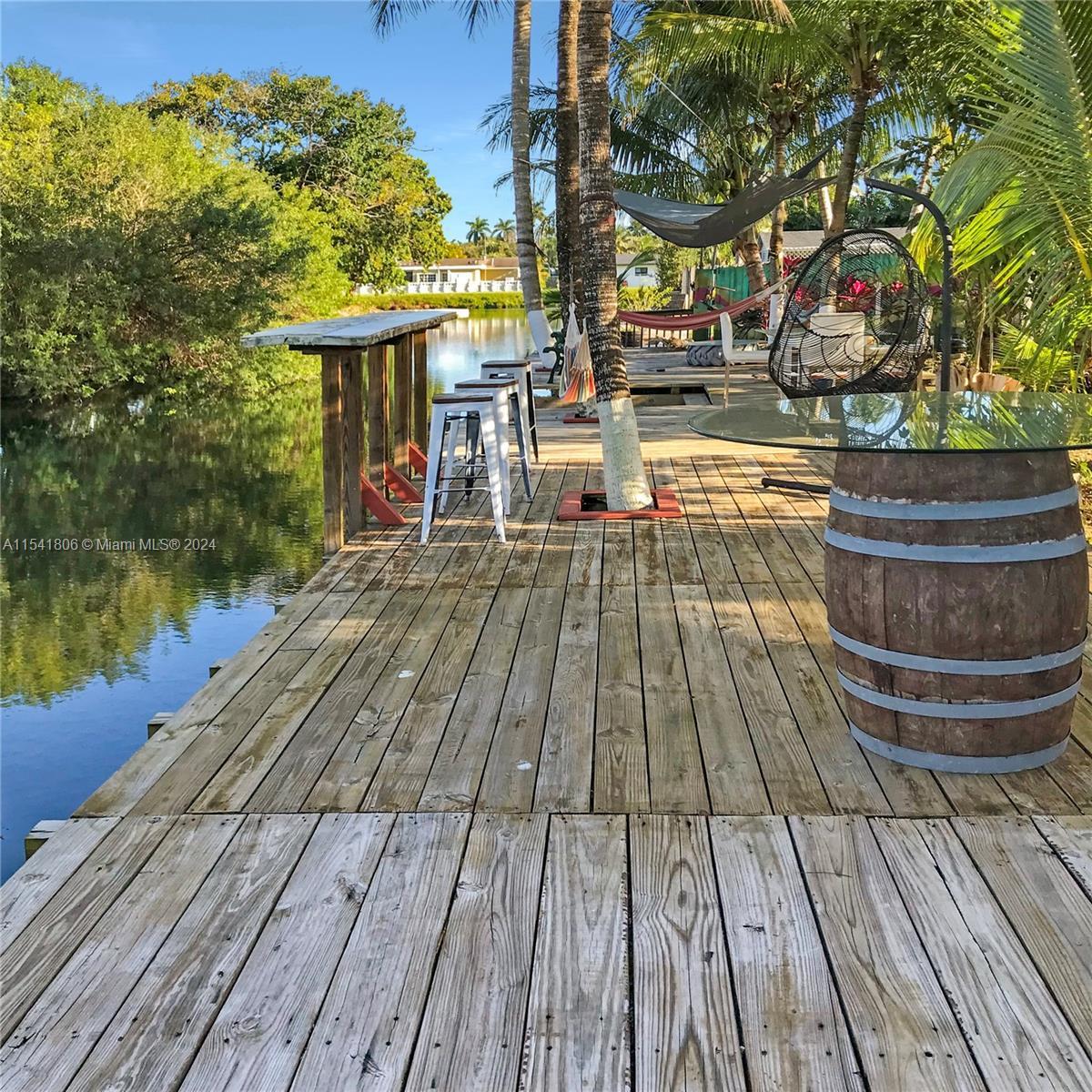 Welcome to this beautiful canal front home in Palmetto Bay. This lovely property features updated ki