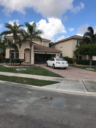 Photo of 3829 NW Woodfield Dr in Coconut Creek, FL