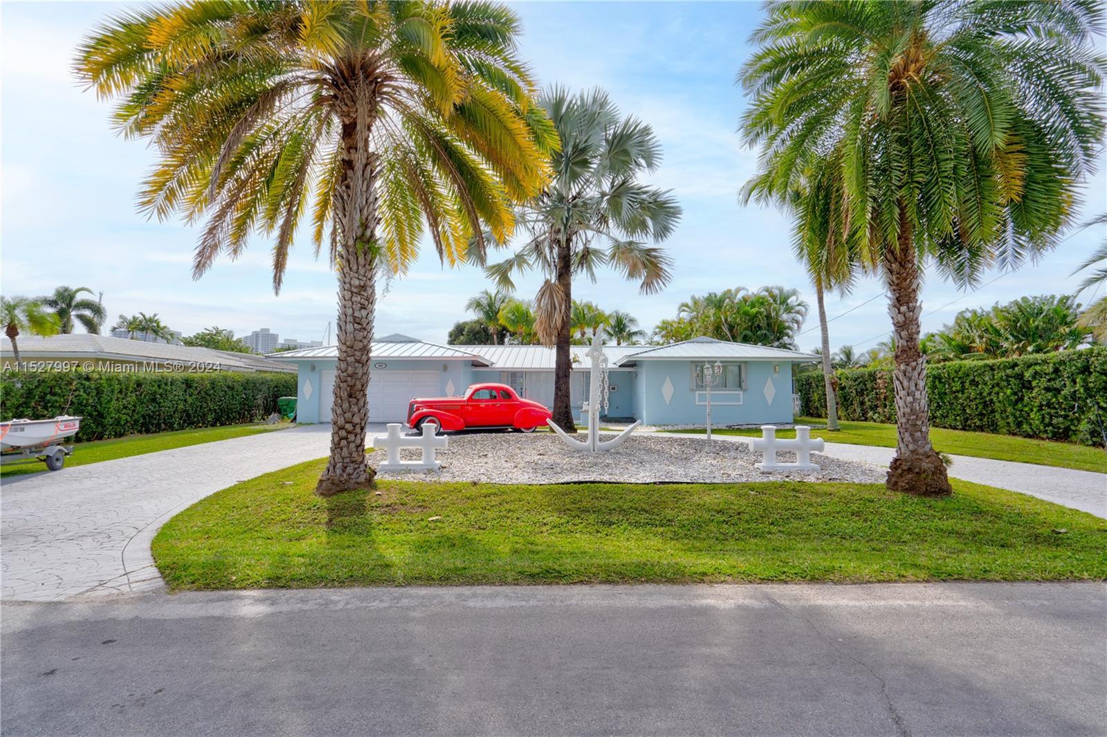 Welcome to your dream home in prestigious Golden Isles Estates, Hallandale Beach! This luxurious 3-b