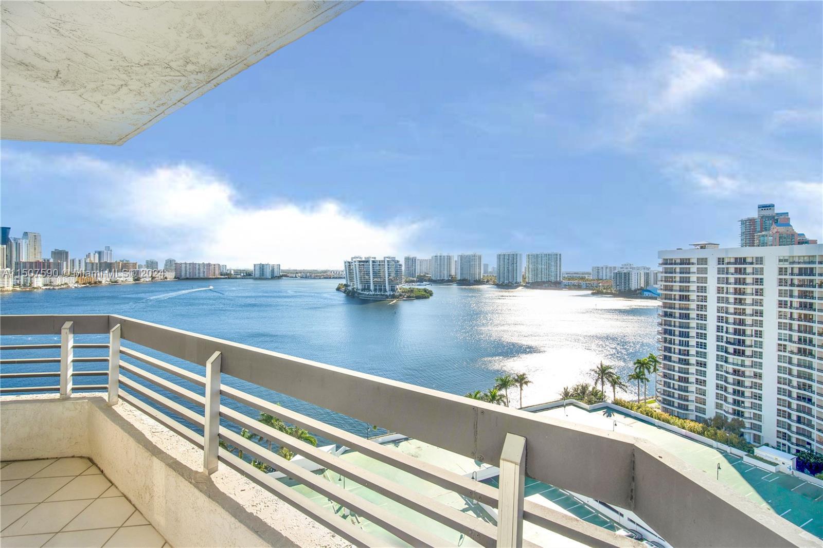 Stunning panoramic views of the bay and skyline from the huge wraparound balcony of this spectacular