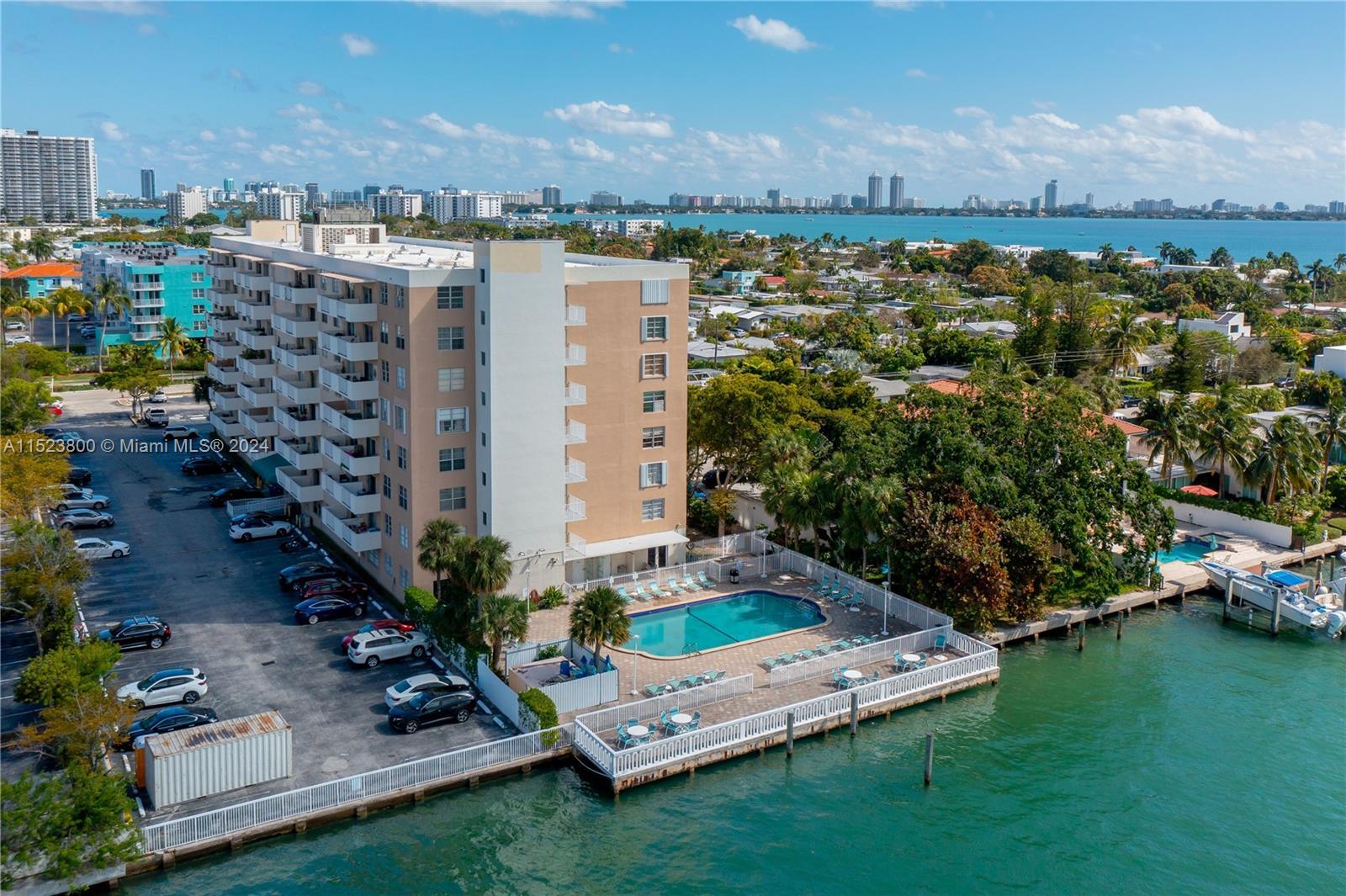 Captivating Biscayne Bay views from this impeccably renovated North Bay Village condo! This 1-bedroo