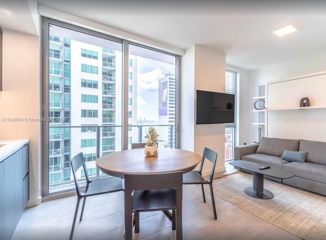 Experience the epitome of urban living in this chic studio apartment located in the heart of Downtow