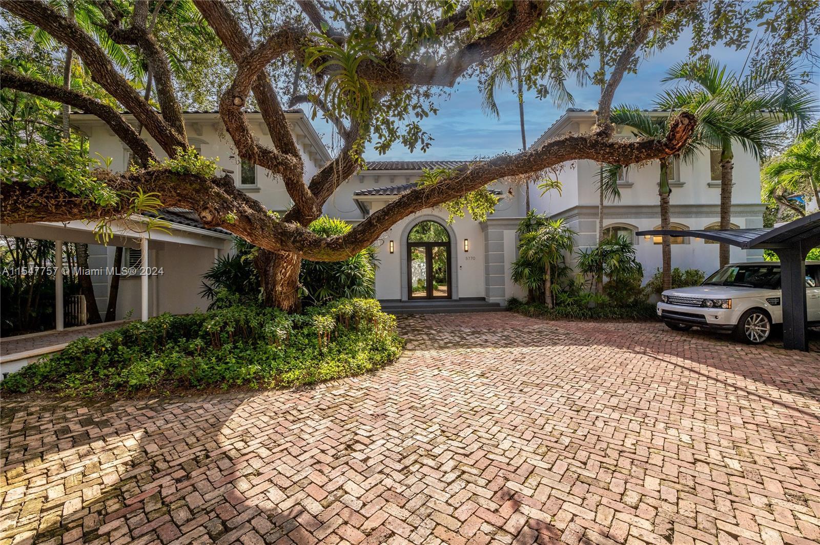 Mediterranean gem, ideally located on a private street, in the beautiful gated community of Palms Es