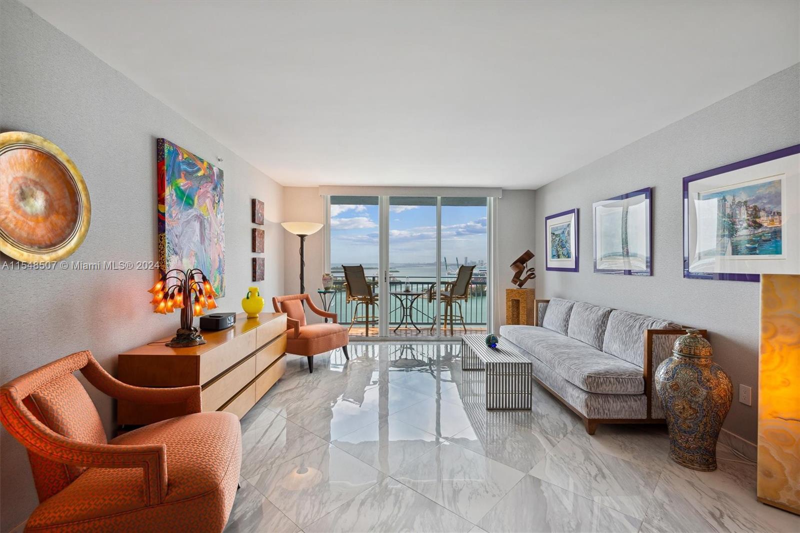 This fully renovated 2-bedroom unit in The Yacht Club at Portofino offers magnificent West views of 