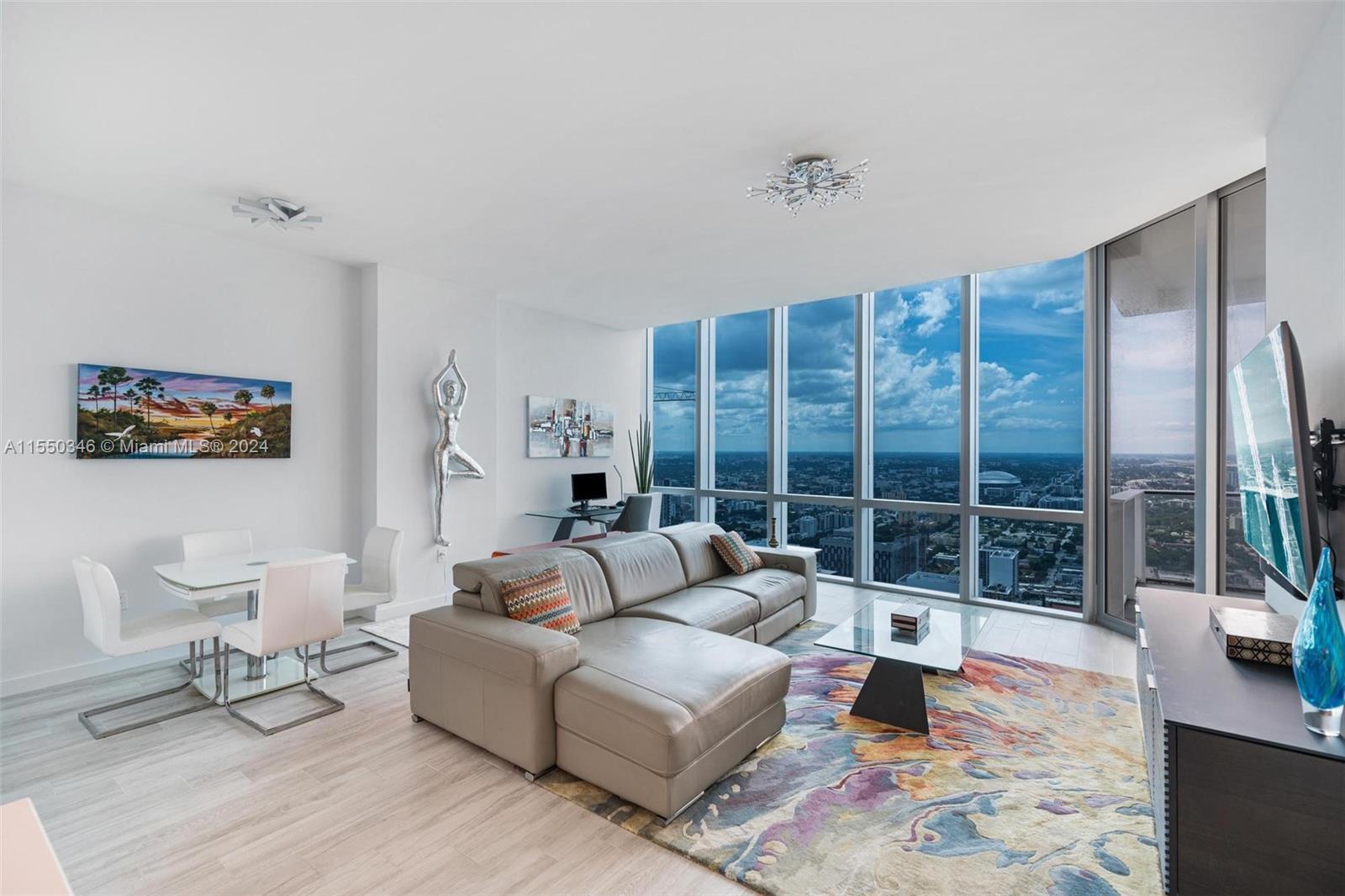 Welcome to the absolute largest 2bed/2bath condo 1,366 sq ft with stunning water, city & skyline vie