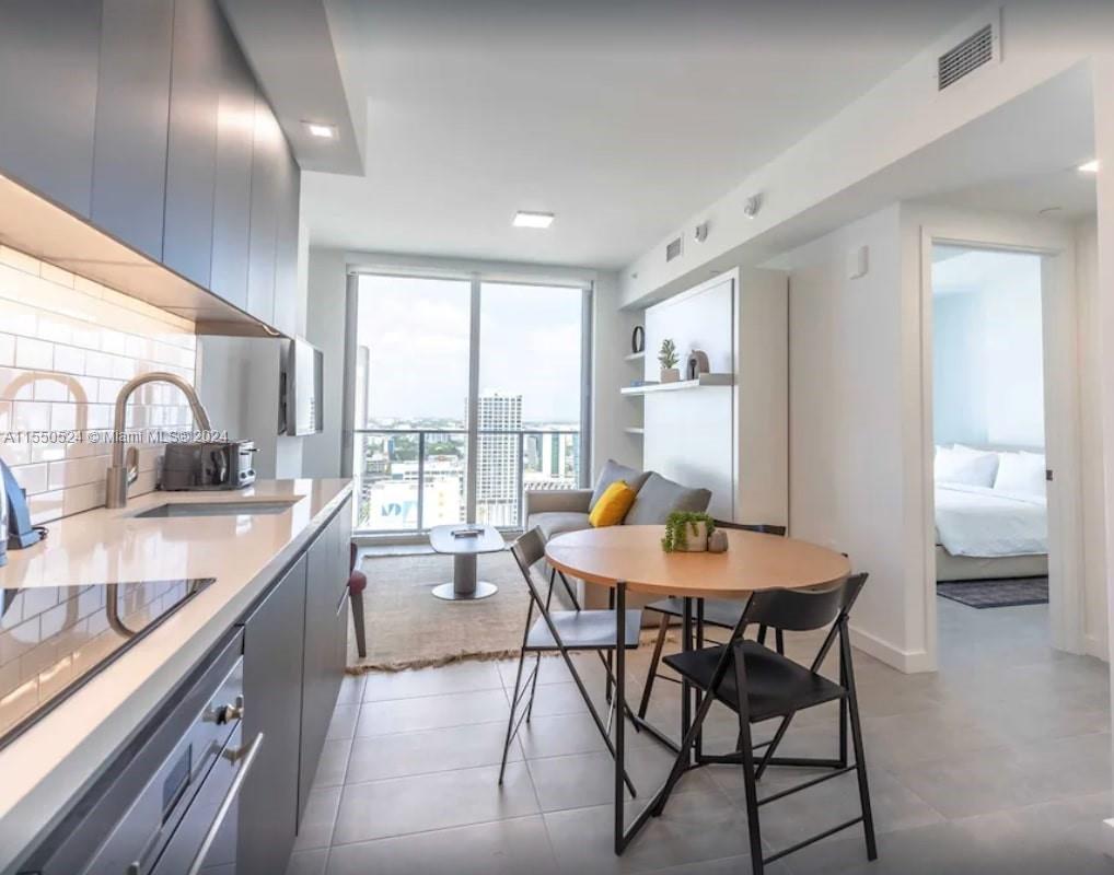 This furnished 1-bedroom, 1-bathroom unit is ideally situated in the vibrant heart of downtown Miami