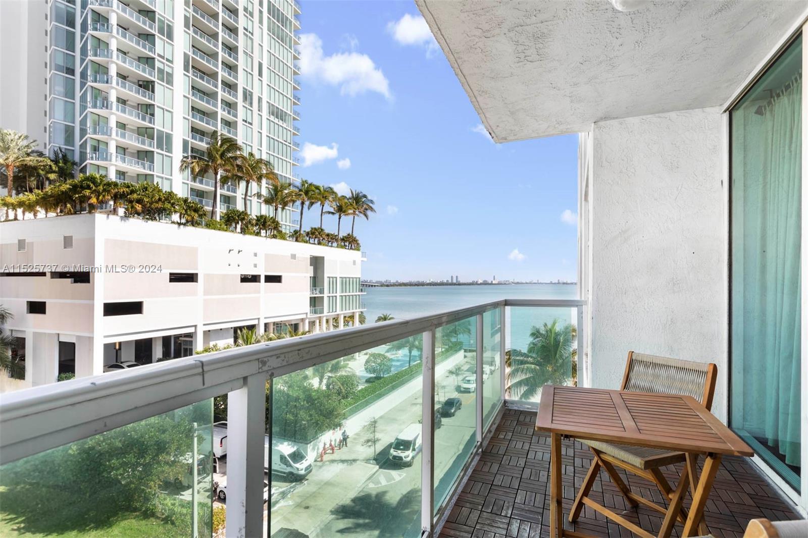 Indulge in luxury with this stunning 1-bed, 1-bath residence featuring breathtaking bay views, a spa