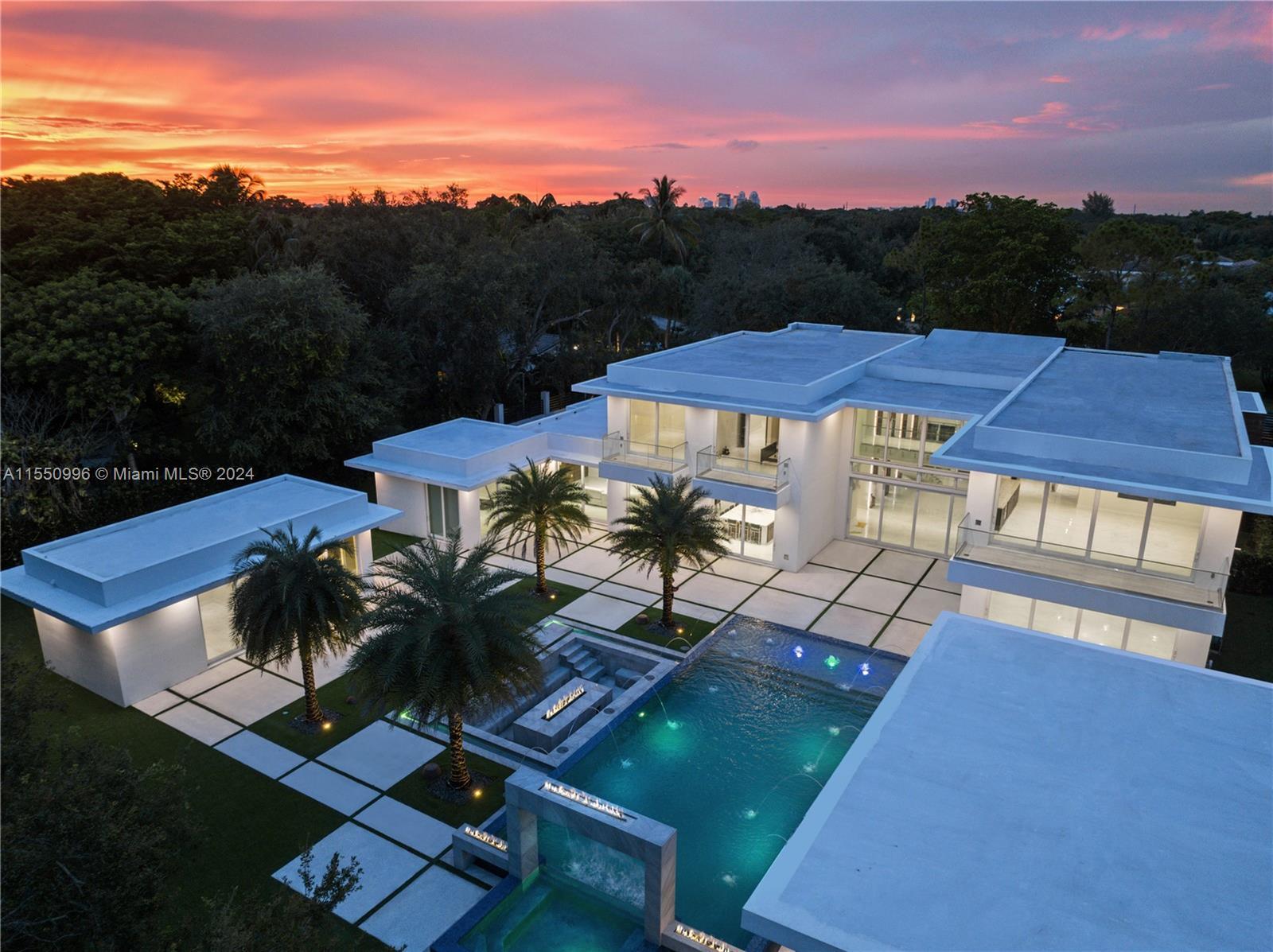 Resort-style living on a Pinecrest Acre+ lot, "PERFECTION". A 2020-built modern work of art. Greeted