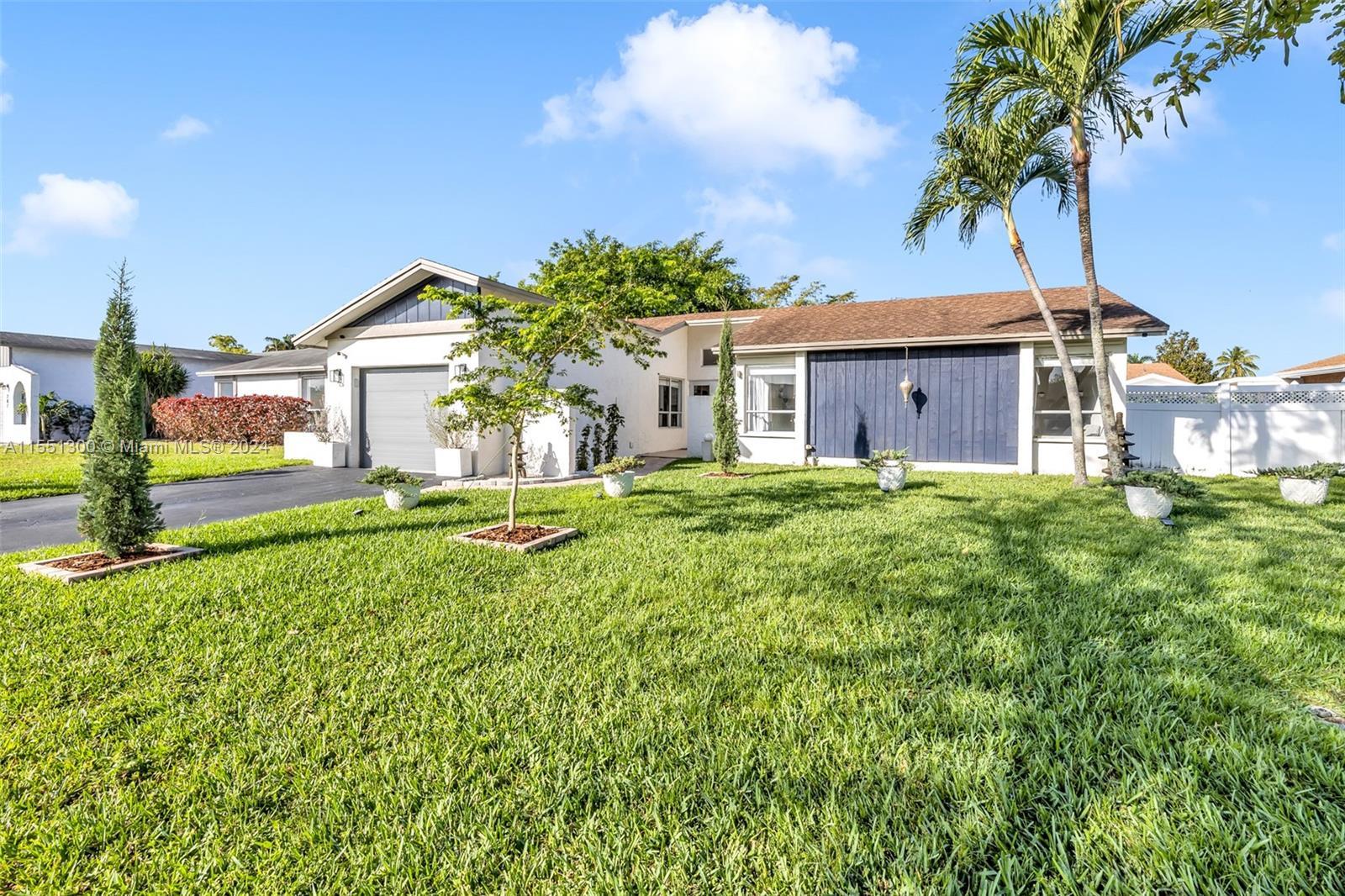 Photo of 303 NW 41st Ave in Deerfield Beach, FL