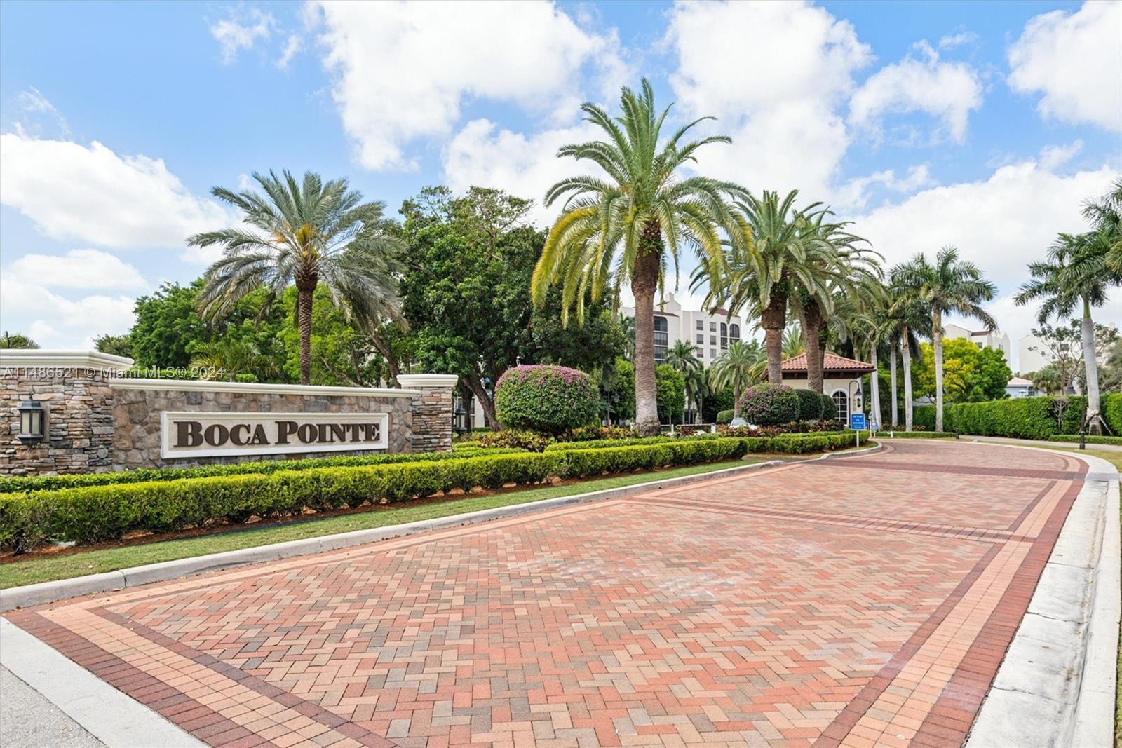 Looking for a single family home in the gated Boca Pointe community where no membership is required?