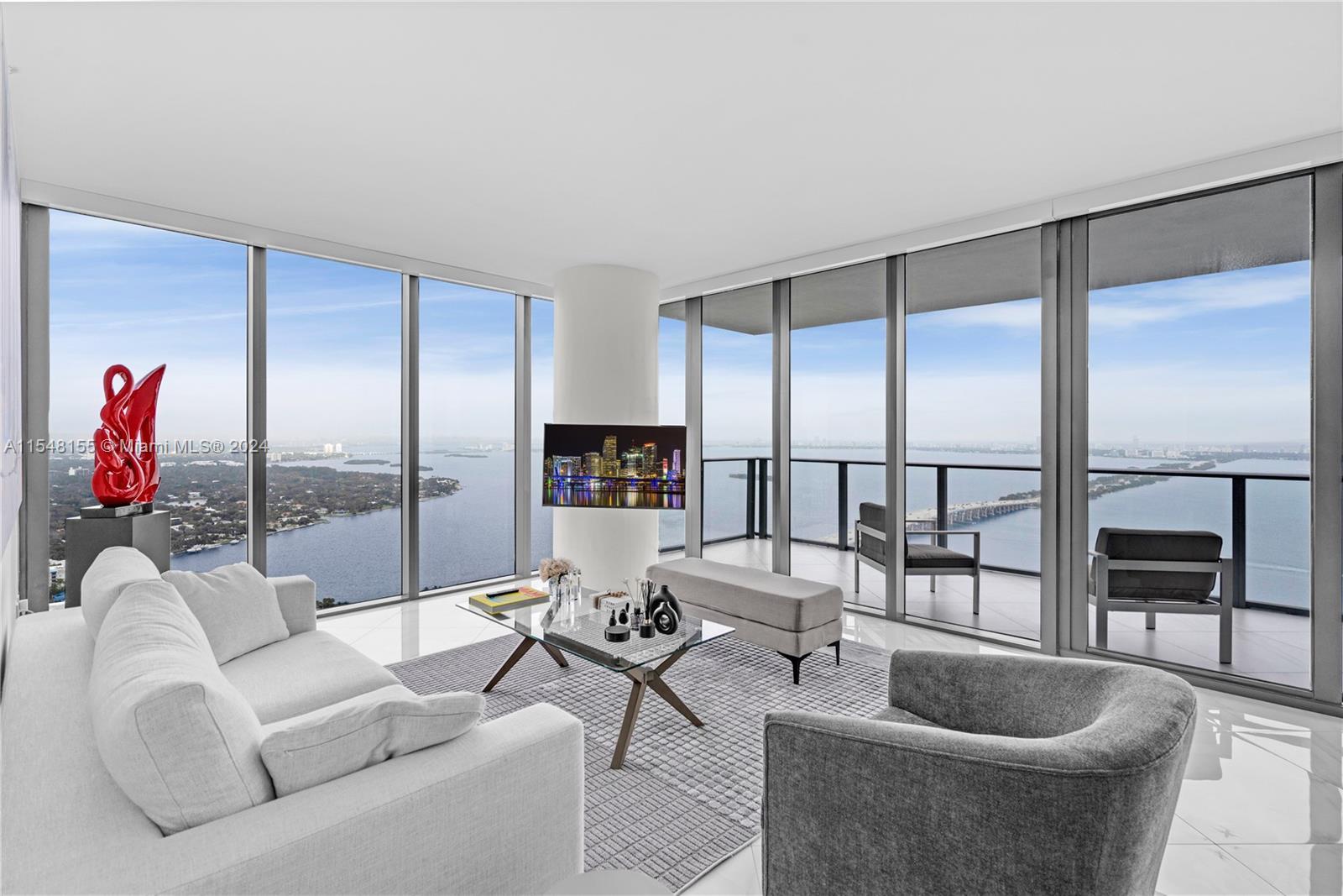 Luxury living at its finest in this exceptional corner unit at One Paraiso. Featuring stunning bay v